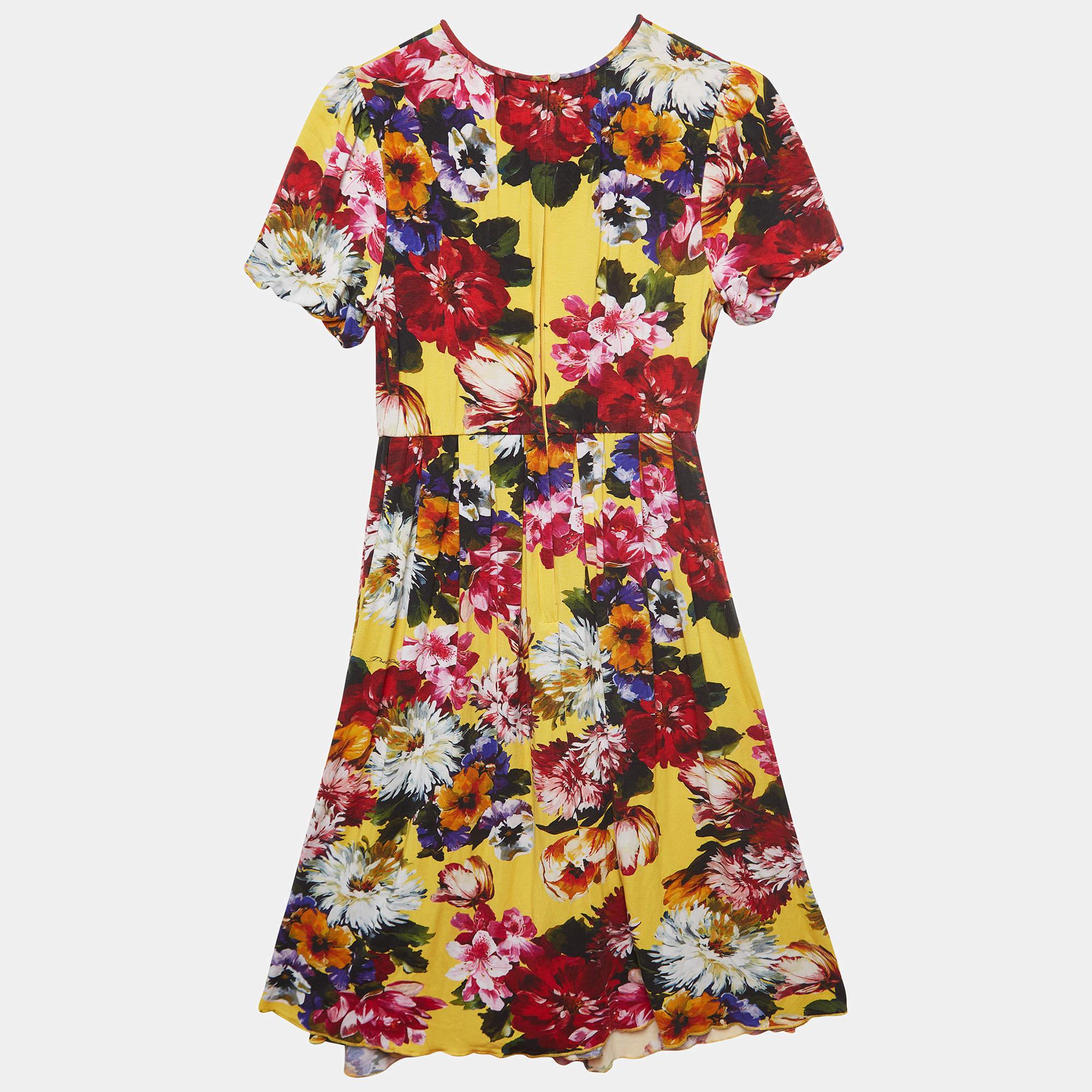 Elevate your little one's style with the Dolce & Gabbana dress. Meticulously crafted for durability and comfort, its ageless floral design blends timeless elegance with trending fashion, ensuring your young one stands out in this impeccably