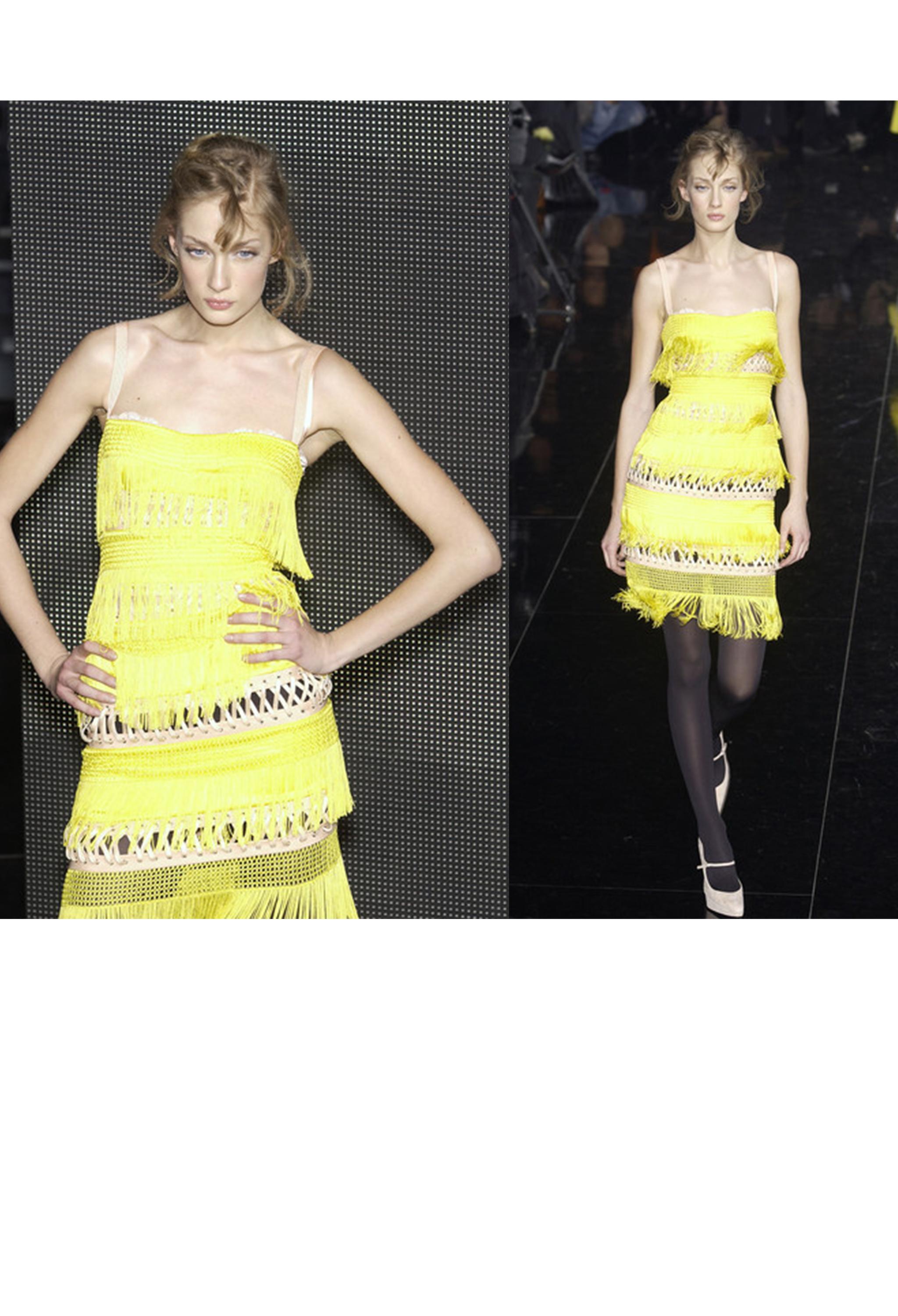 Resurrection Vintage is excited to offer a vintage Dolce & Gabbana yellow fringe party dress featuring nude casing with decorative corset seaming on the under layer, internal bra, nude straps, tiered fringe panels, knotted crochet panels, a center