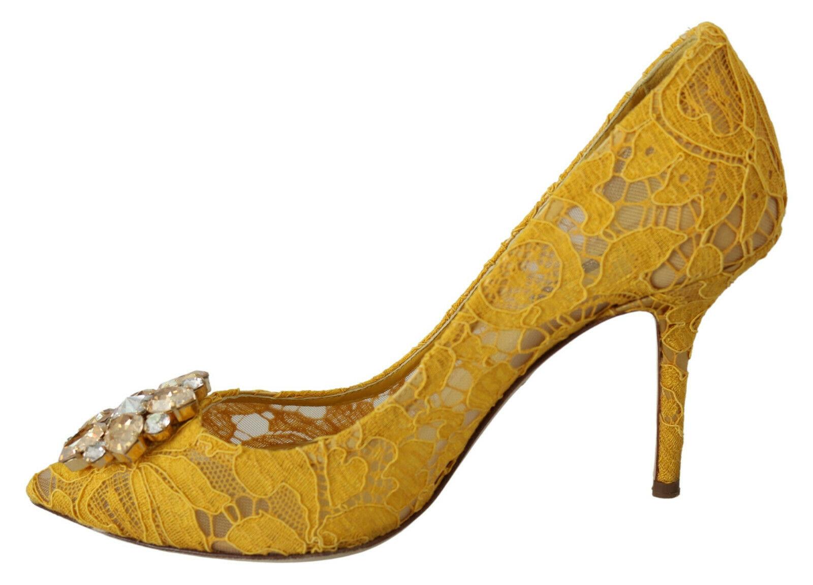  Gorgeous brand new with tags, 100% Authentic Dolce & Gabbana Pointy pumps with jewel rhinestones.
 


Model: Pumps

Color: Yellow
Material: 57% Viscose 36% Cotton 5% Nylon 2% Silk


Sole: Leather


Logo details

Very high quality and comfort

Made