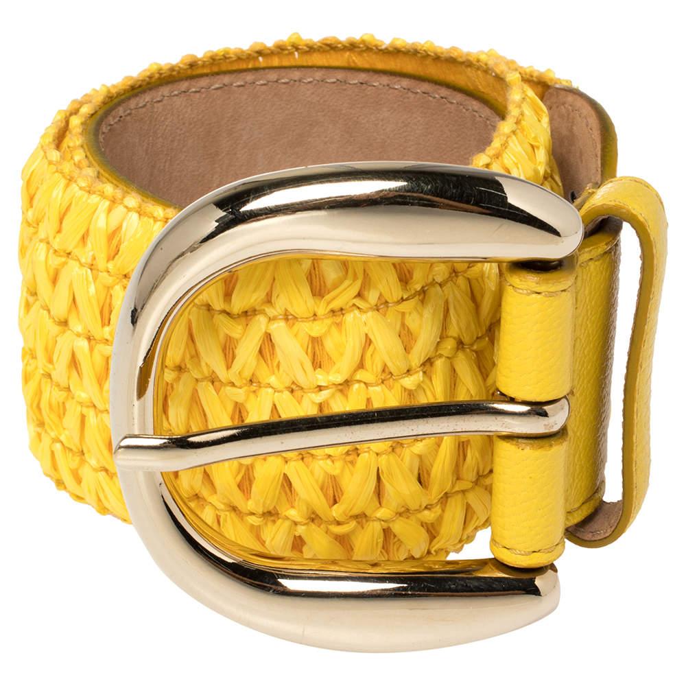 Your belt collection will get a stylish update with this Dolce & Gabbana creation. The yellow piece is crafted from leather and straw and detailed with a gold-tone pin buckle. It is equipped with a single loop and will look great with your denims