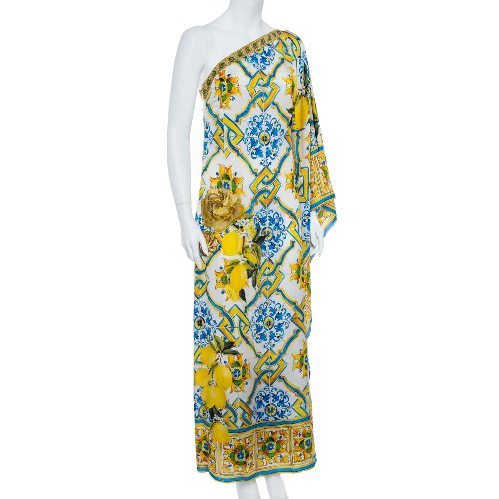 This flowy gown was a standout piece on Dolce & Gabbana's SS16 runway and is etched to its Italian roots. It's printed with a blue and yellow pattern inspired by traditional Sicilian Majolica tiles and cut to fall beautifully over the figure with a
