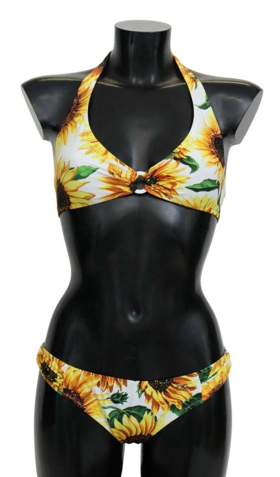 Gorgeous brand new with tags, 100% Authentic Dolce & Gabbana two piece bikini with sunflower print.

Color: Yellow

Model: Bikini two piece set, top and bottom

Material: 75% Nylon 25% Elastane

Logo detailing

Made in Italy


Size: 2IT corresponds