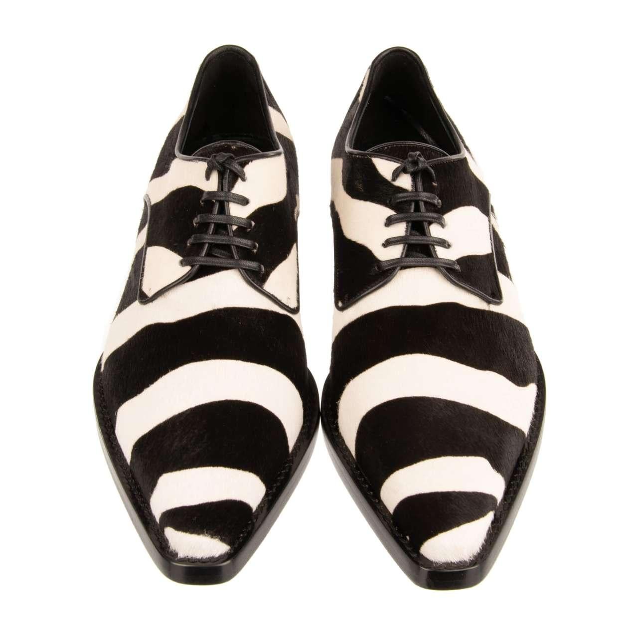 - Classic pony fur leather shoes ZANZARA with pointy toe shape and zebra print in black and white by DOLCE & GABBANA - MADE IN ITALY - New with Box - Model: CN0052-AC861 - Material: 80% Calf fur, 20% Lamb leather - Sole: Leather - Color: Black /