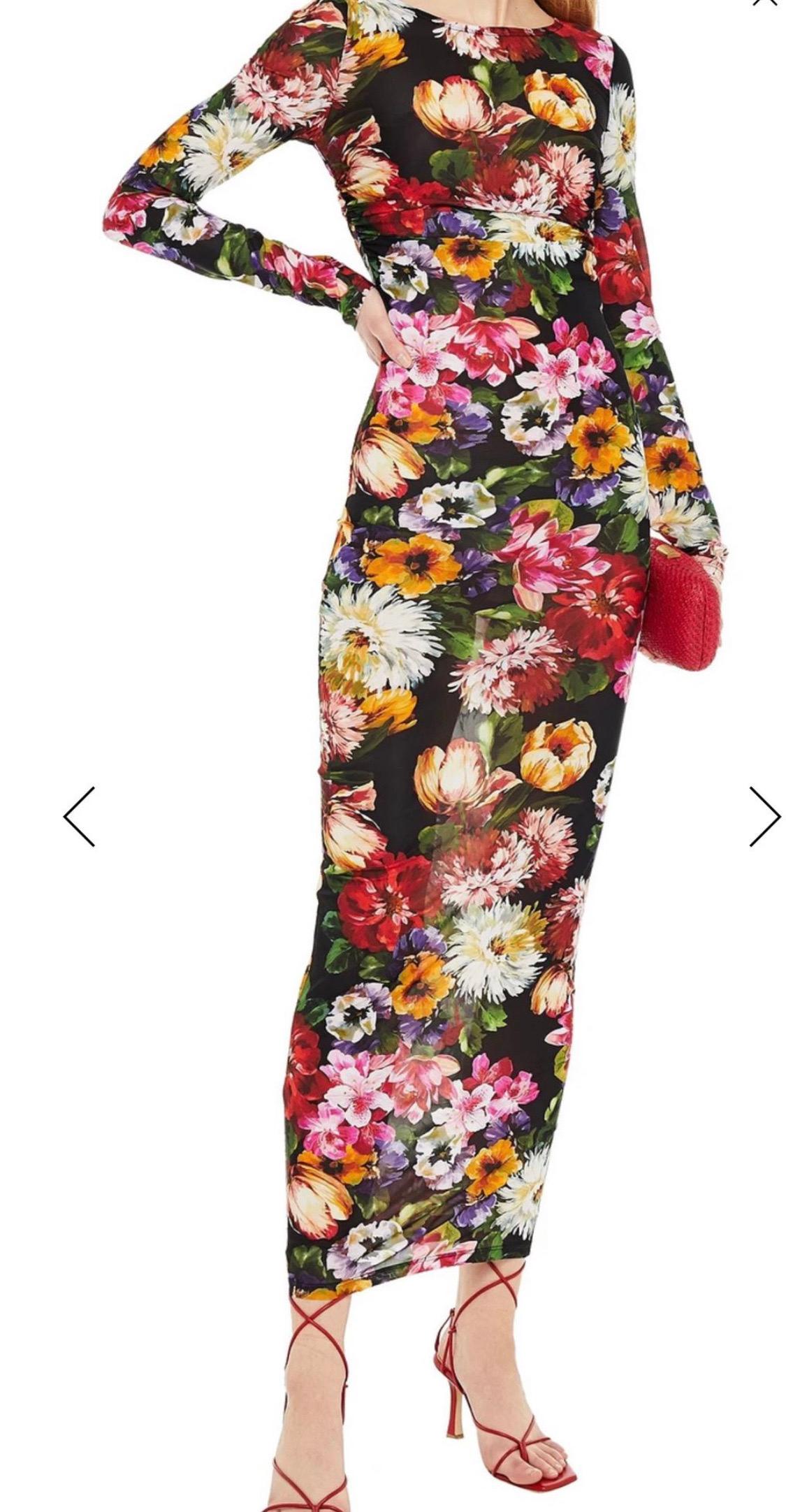 Gorgeous brand new with tags,
100% Authentic Dolce & Gabbana
Colorful sheer dress. Decorated with a
printed floral motif features a round
neck and long sleeves.

Model: Maxi dress

Color: Black with multicolor floral print
Zipper closure on the