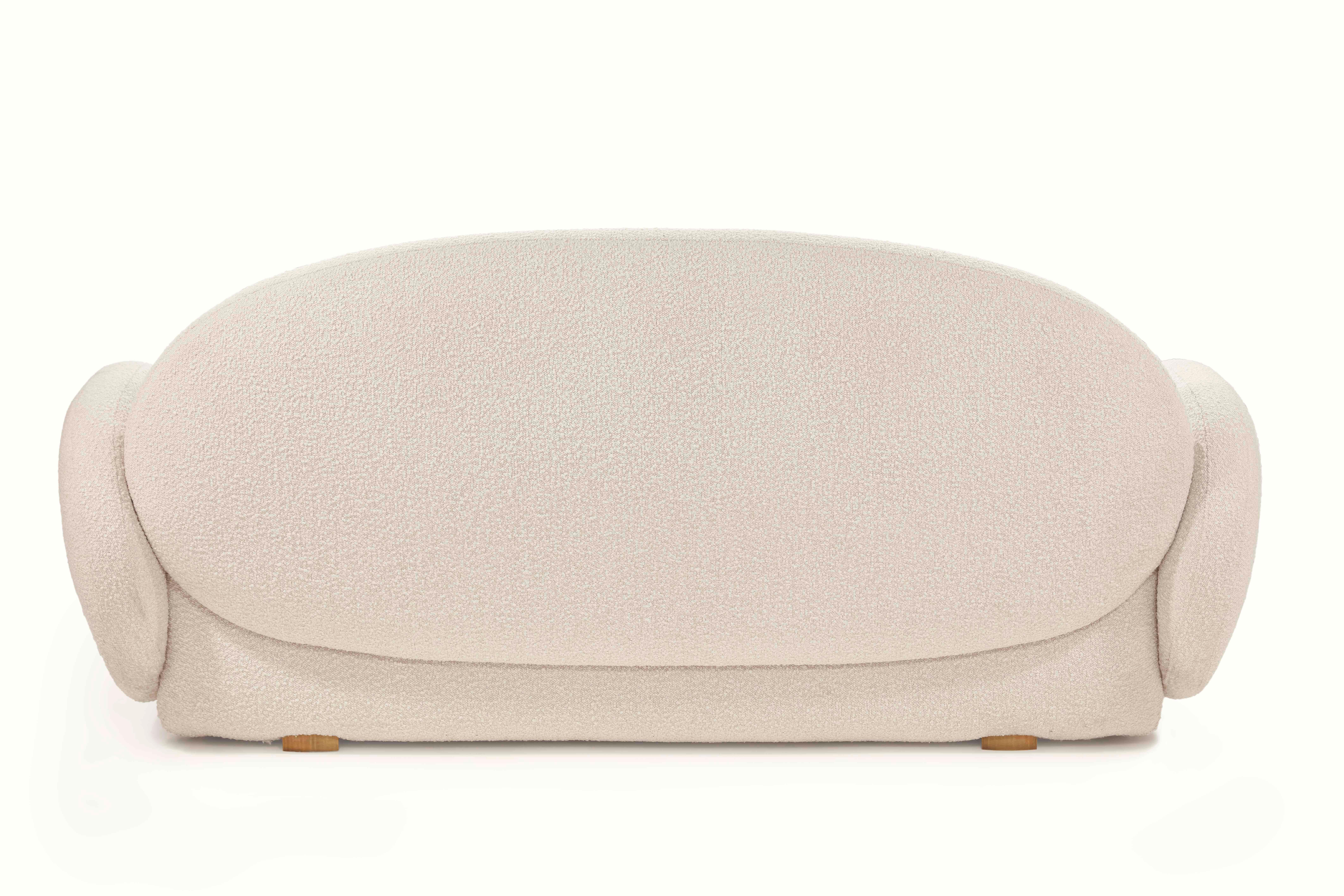 Dolce Sofa Ivory is an exquisite and ergonomically perfect three seater sofa upholstered in plush ivory boucle fabric, ideal for playful lazing! Designed by Matteo Cibic

Have you heard of Matteoverse?
It's an amazing place where you can explore,