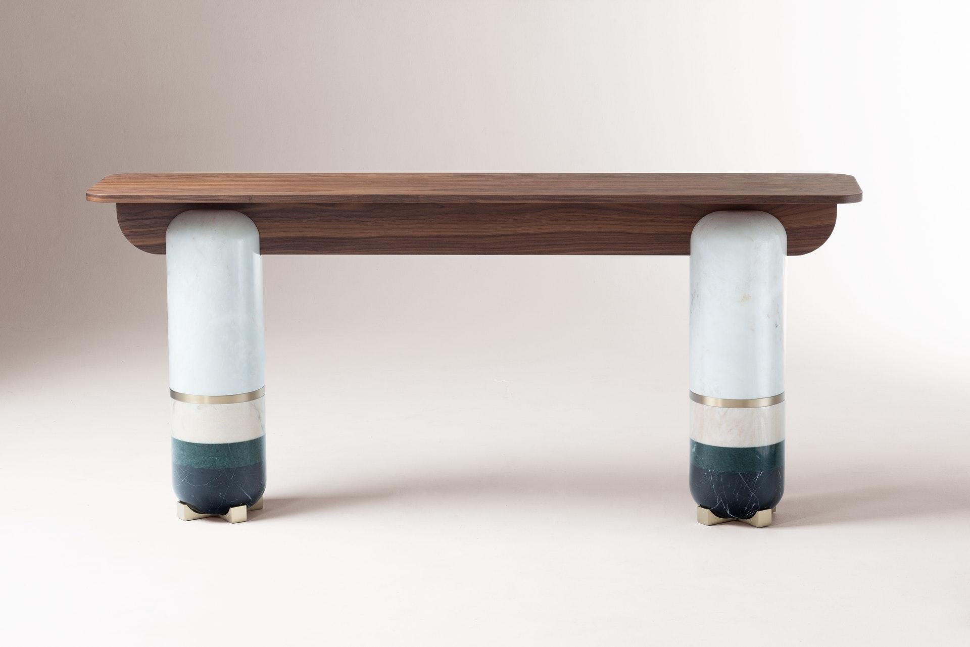 Dolce Vita console transports you to a time of greatness and opulence which we can still find very much alive in Rome. Rich materials take the form and proportion of ancient structures connecting them to a modern functionality and purpose. 
Bauhaus