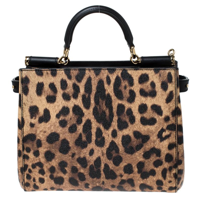 This gorgeous leopard print Miss Sicily tote from Dolce & Gabbana is a handbag coveted by women around the world. It has a well-structured design and opens to a compartment with fabric lining and enough space to fit your essentials. The bag comes