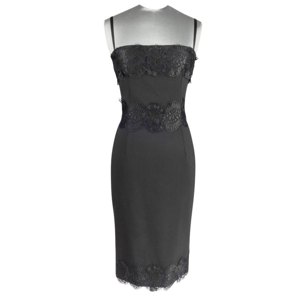 Mightychic offers a Dolce&Gabbana black cocktail sheath dress. 
Overlay lace on bust, waist and hem.
Dress has built-in underwire bra with adjustable bra straps. 
Hidden rear zip.
So chic
Fabric is wool, viscose and elastane.
final sale

SIZE 40
USA
