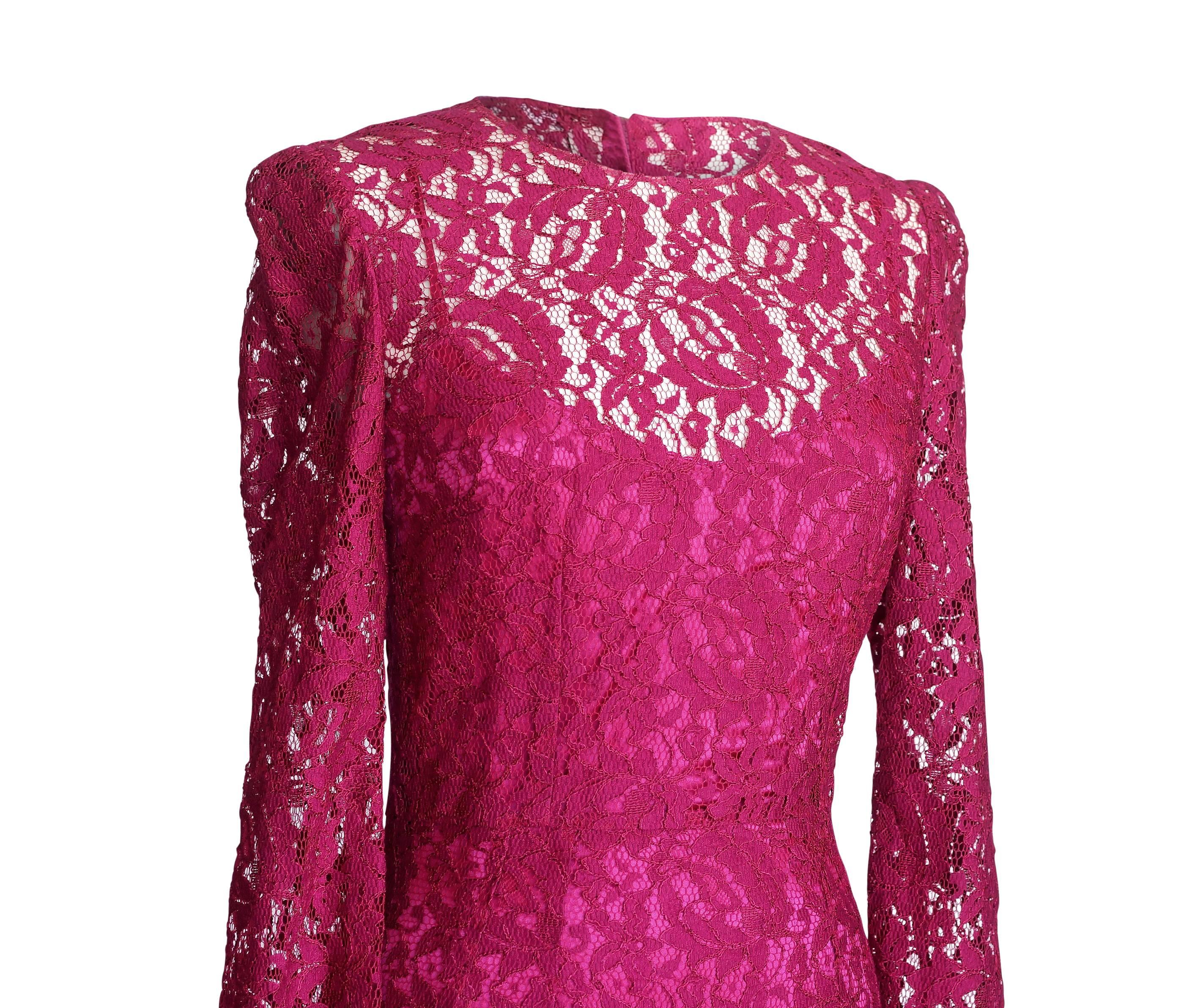 Classic Dolce&Gabbana jewel toned raspberry pink lace dress.  
Beautifully cut shaped long sleeved rich lace.
Rear hidden zip.
Comes with separate raspberry silk slip.
Fabric is rayon and nylon.
NEW or NEVER WORN.
final sale   
  
SIZE  42
USA SIZE 
