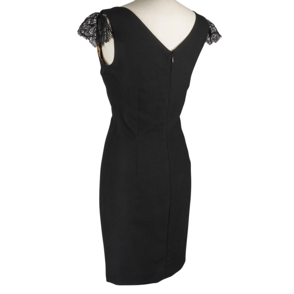Mightychic offes a guaranteed authentic Dolce&Gabbana versatile black dress with lace insets.   
Chic little black dress has the prettiest lace inset at sweetheart neckline.
Lace hint at cap sleeves.
Hidden rear zipper.
Signature Dolce&Gabbana