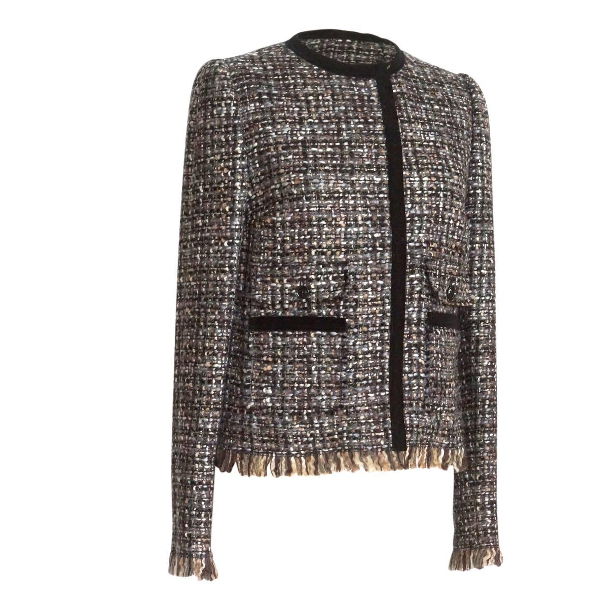 Guaranteed authentic Dolce&Gabbana brown, grey black and silver fantasy tweed jacket. 
Fringe at cuff and hem of jacket.
Black velvet border around jewel neck and down the front of the jacket.
Two front pockets have velvet border and decorative