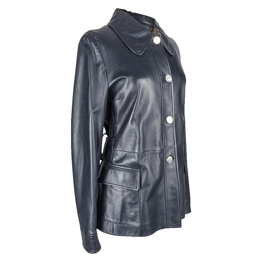 Guaranteed authentic Dolce&Gabbana  fabulous leather jacket with a narrow straight cut. 
4 Button Single breast inky blue buttery soft leather jacket with super details.  
Cuff with 2 buttons.
Rear 'belt tab' with 2 buttons.
All buttons are polished