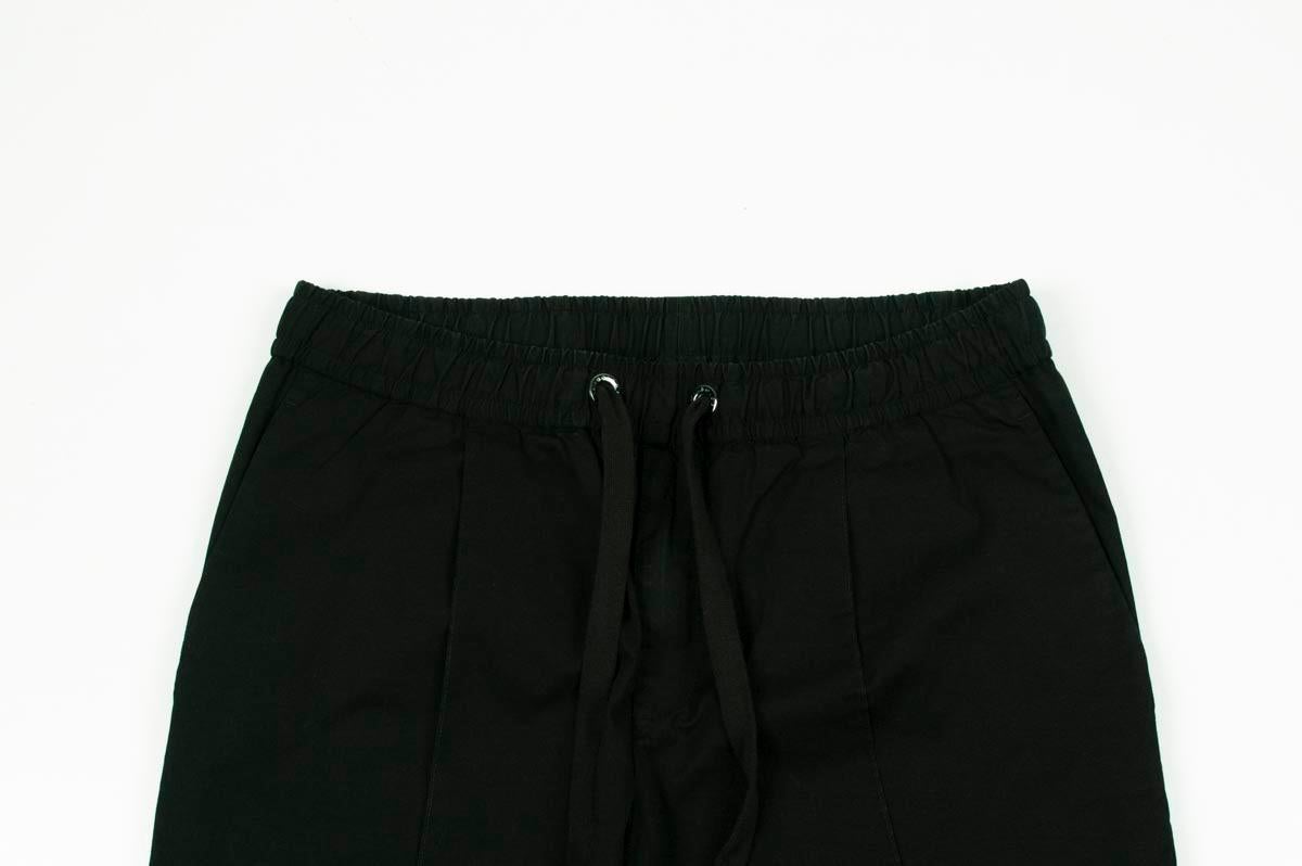Item for sale is 100% genuine Dolce&Gabbana Mainline Adjustable Waist Men Pants, S203
Color: Black
(An actual color may a bit vary due to individual computer screen interpretation)
Material: 97% cotton, 3% elastane
Tag size: ITA50 
Thesepants are