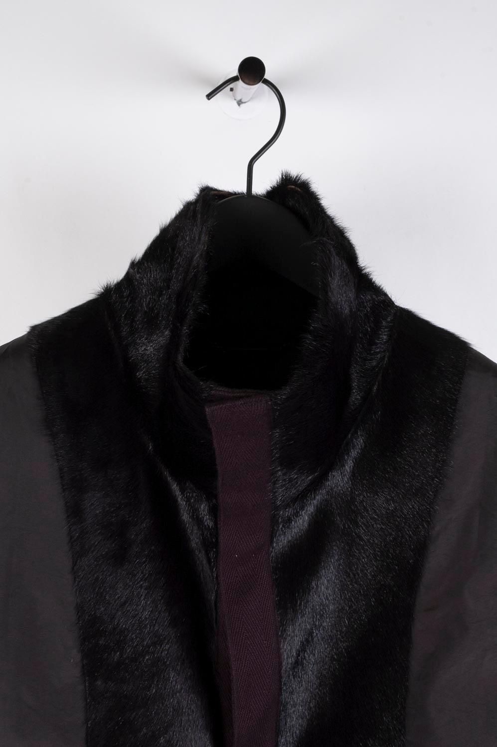 Item for sale is 100% genuine Dolce&Gabbana Fur Men Minimalistic Vest, S432
Color: Black
(An actual color may a bit vary due to individual computer screen interpretation)
Material: 60% KID, 28% nylon, 12% polyester
Tag size: 50ITA, Medium
This vest