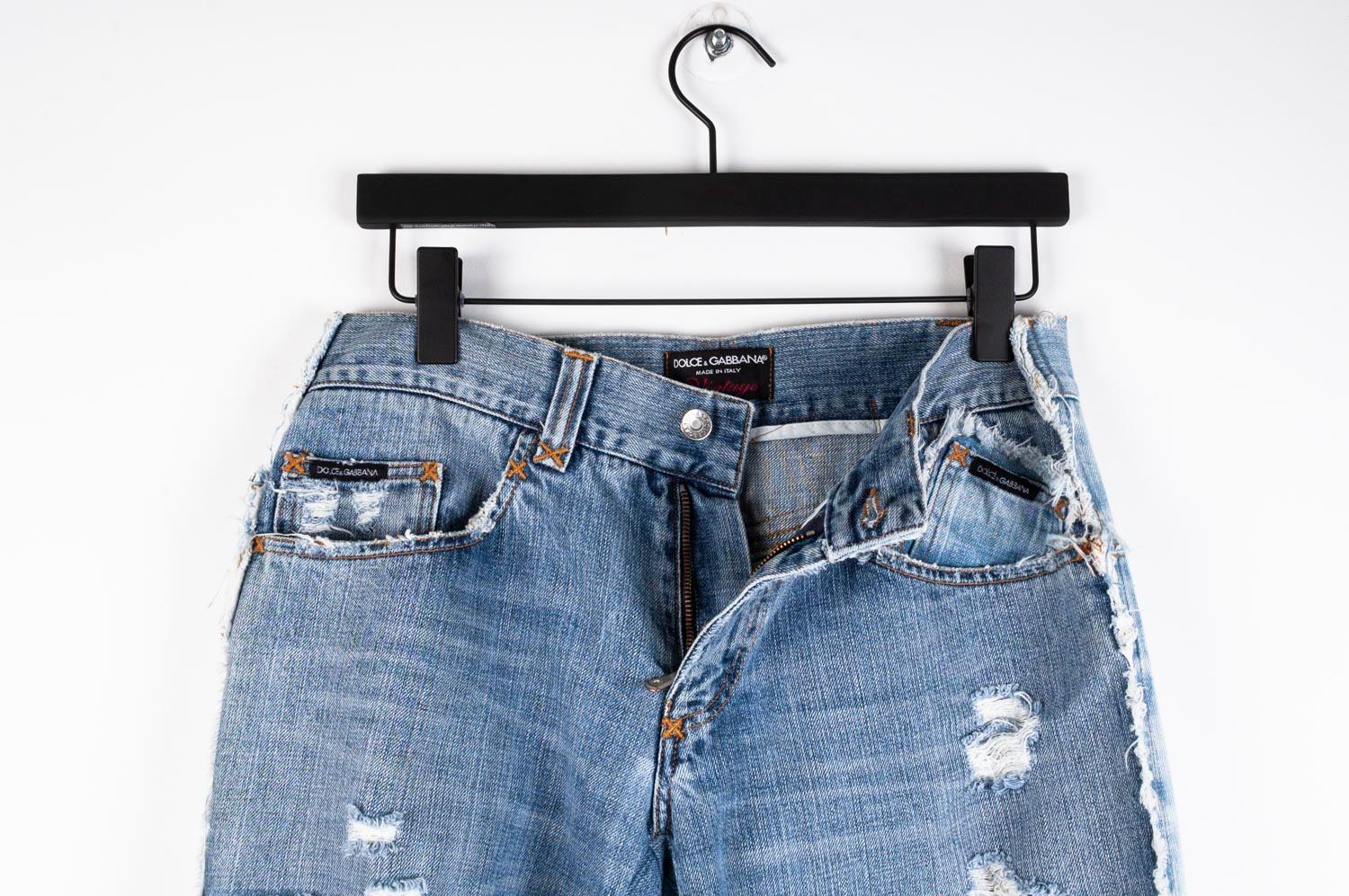 Item for sale is 100% genuine Dolce&Gabbana Vintage Denim Distressed Ripped Knees Men Jeans 
Color: Blue
(An actual color may a bit vary due to individual computer screen interpretation)
Material: 100% cotton
Tag size: ITA 48 (runs loose fit)
These