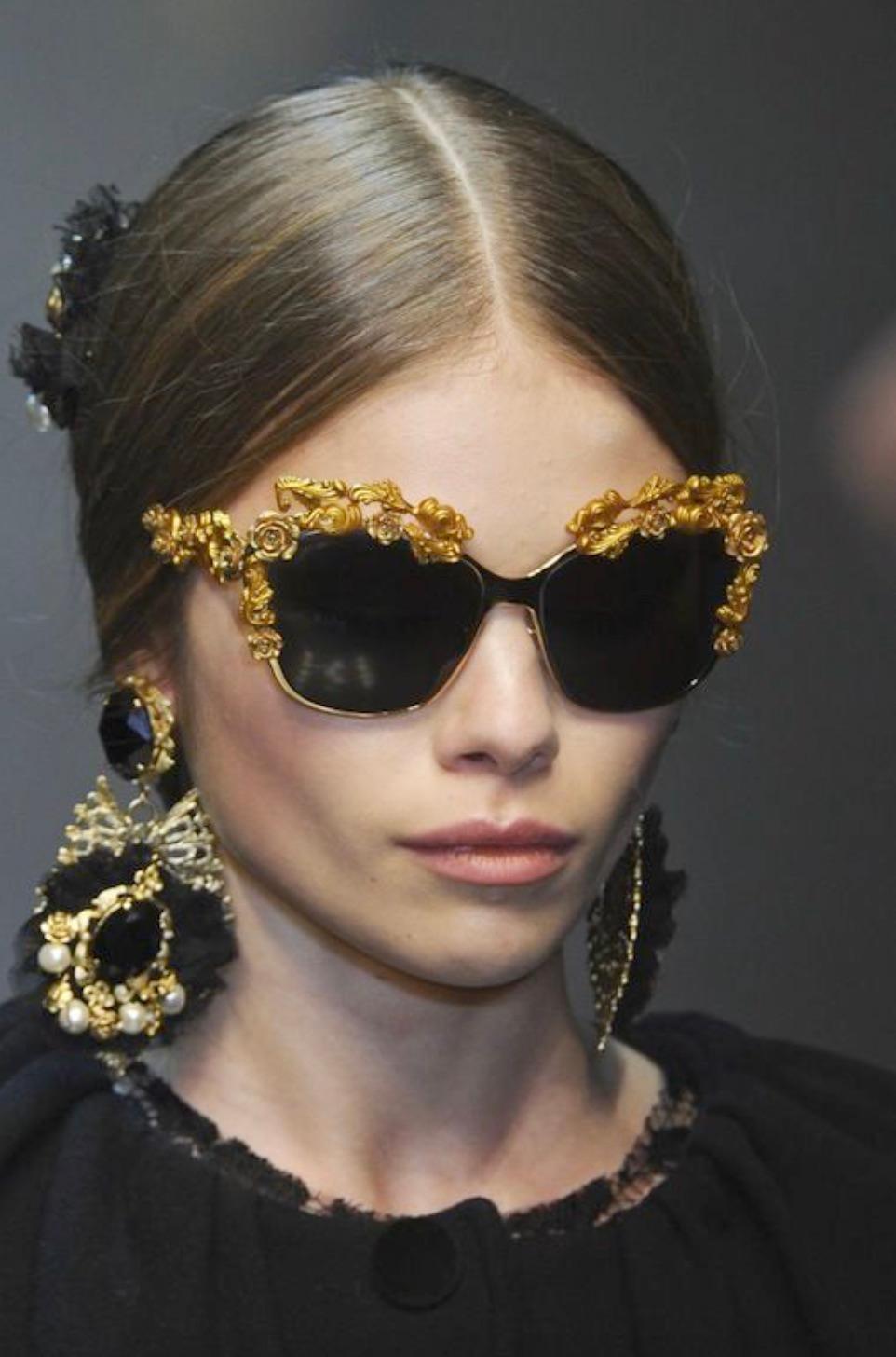 Introducing an exquisite piece from the Dolce&Gabbana Fall/Winter 2013 collection—one of the most stunning and iconic collections ever! Behold the gold baroque sunglasses, a true masterpiece. Crafted from high-quality acetate and gold-plated metal,