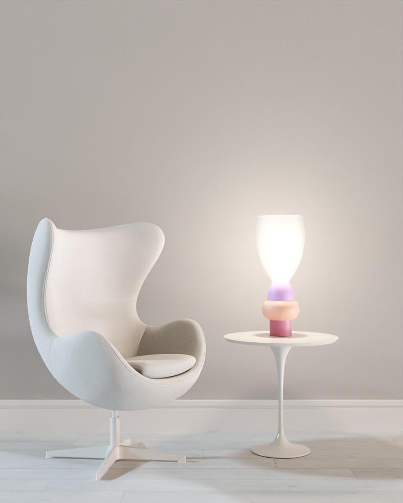 Unique design, crafted carefully piece by piece. Made with Italian acrylic and  matte paint finishing. Available in 3 color options: 
Option 1: all white
Option 2: black and white
Option 3: Orange and blue 
Includes Led Lamp with low energy