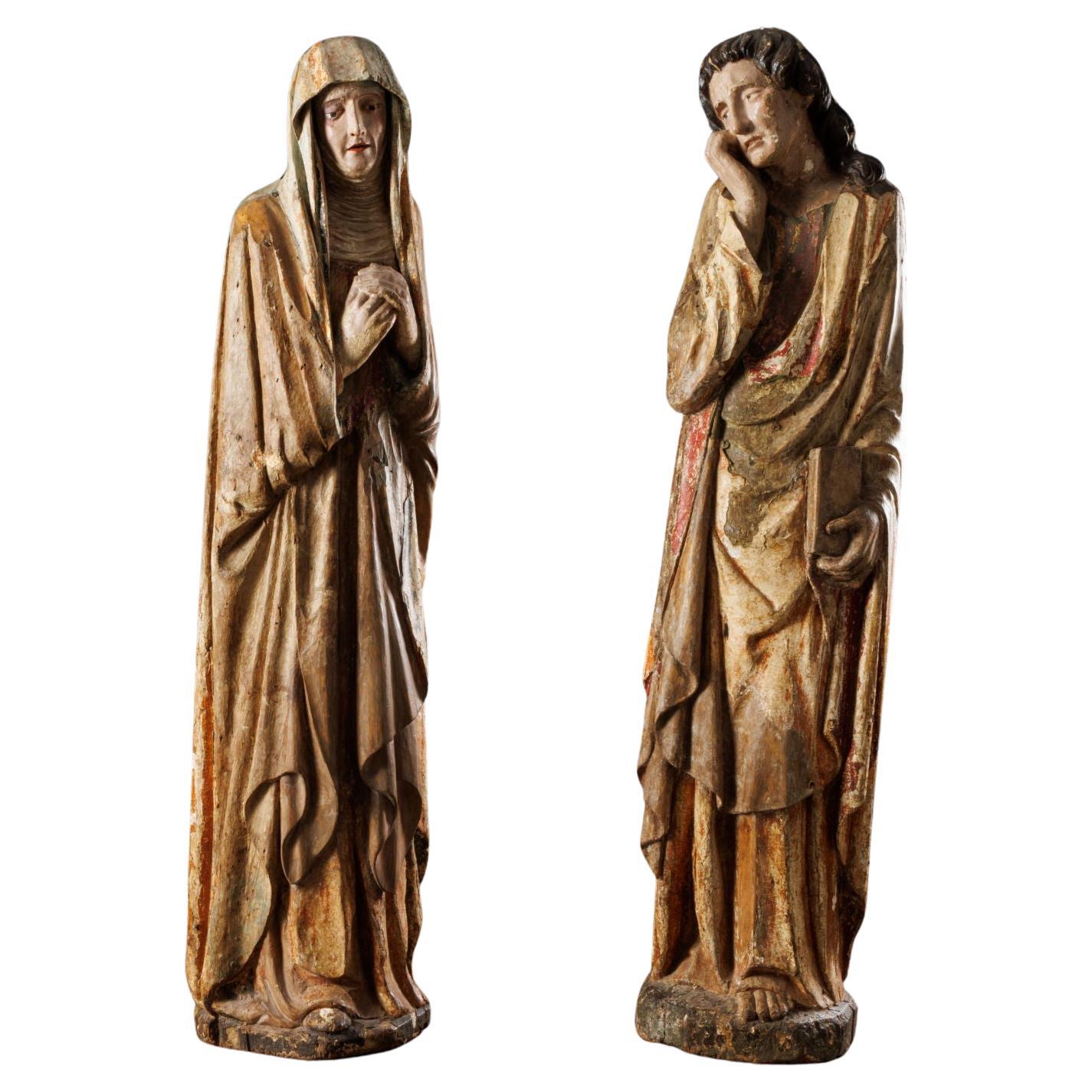 Dolenti (The Virgin and St. John the Evangelist). Piedmontese carver. 1470s For Sale