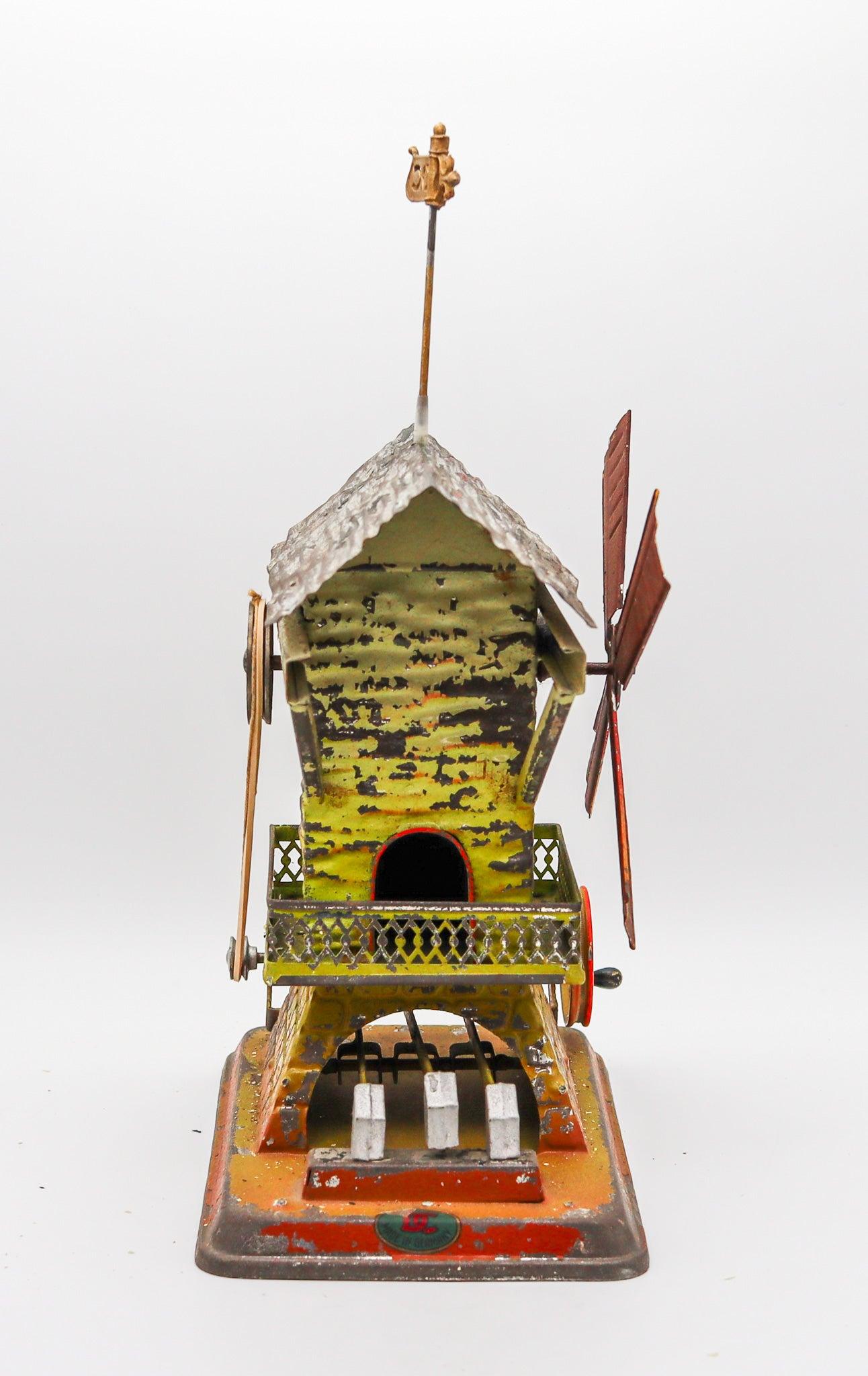 DOLL & Co. 1900 Alemania Manivela Molino de viento Martillo Máquina de vapor Juguete de hojalata en venta 4