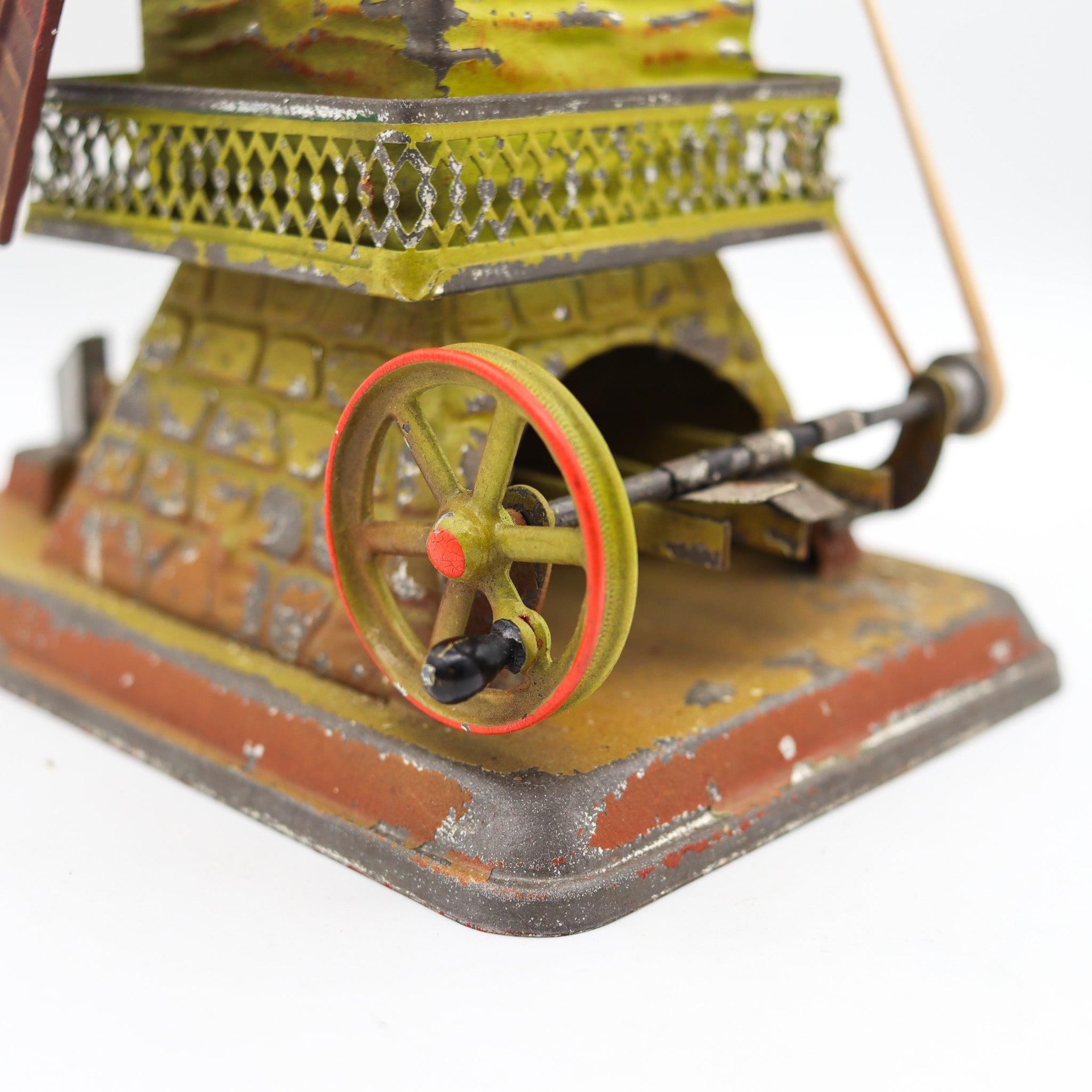 DOLL & Co. 1900 Alemania Manivela Molino de viento Martillo Máquina de vapor Juguete de hojalata principios del siglo XX en venta