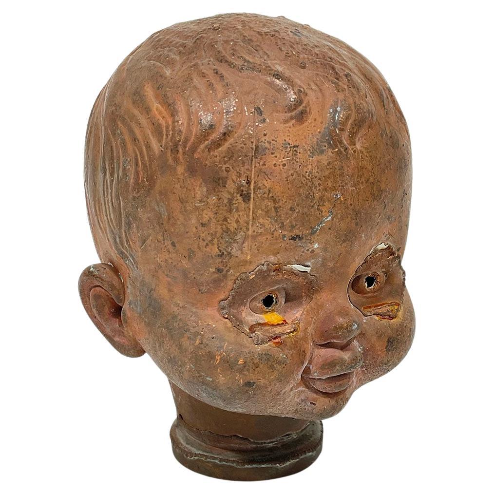 Molde de cabeza de muñeca de mediados del siglo XX