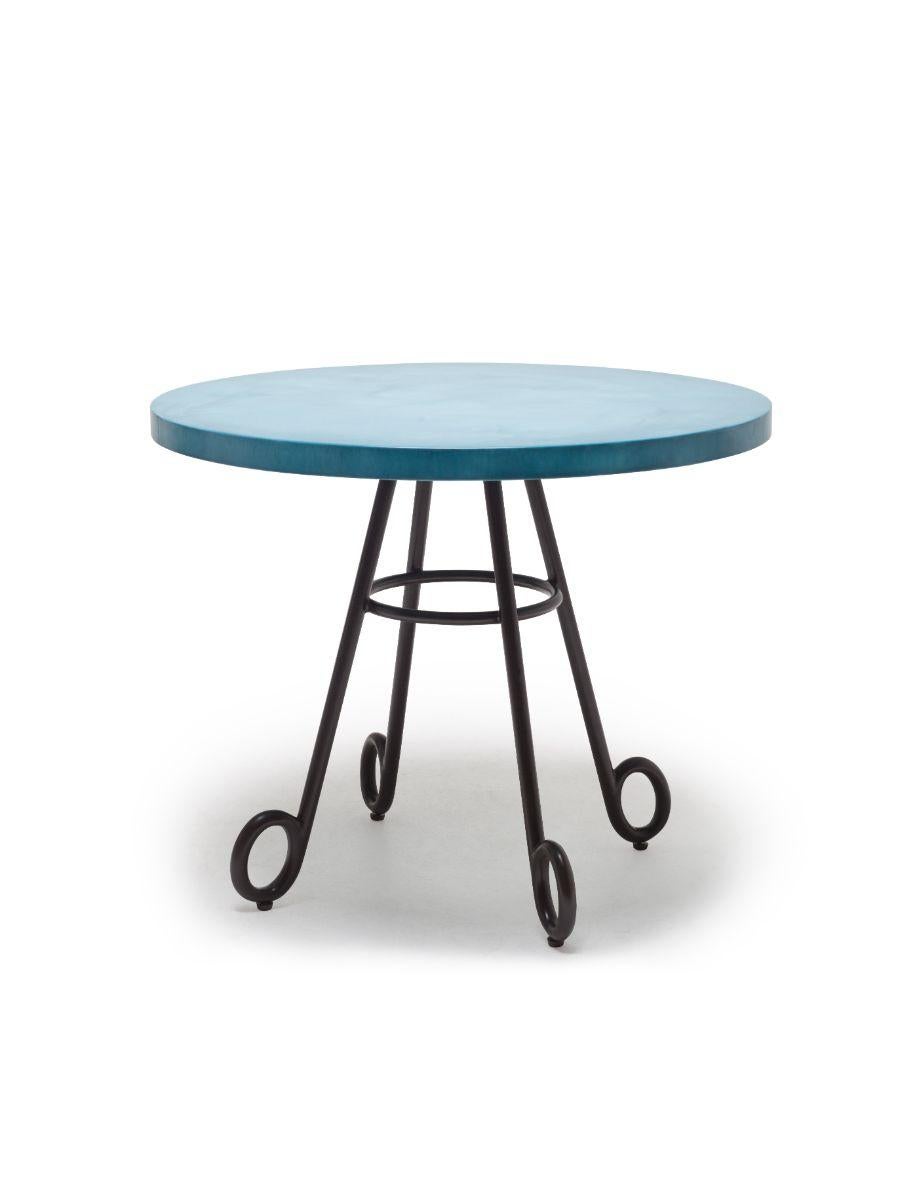 Dolly bistro table by Kenneth Cobonpue
Materials: Fiberglass, aluminum. 
Dimensions: Diameter 80cm x height 65cm 

Dolly is a dainty bistro table, inspired by vintage pieces. Dolly has a special vintage charm that’s all it's own. 

Designer's