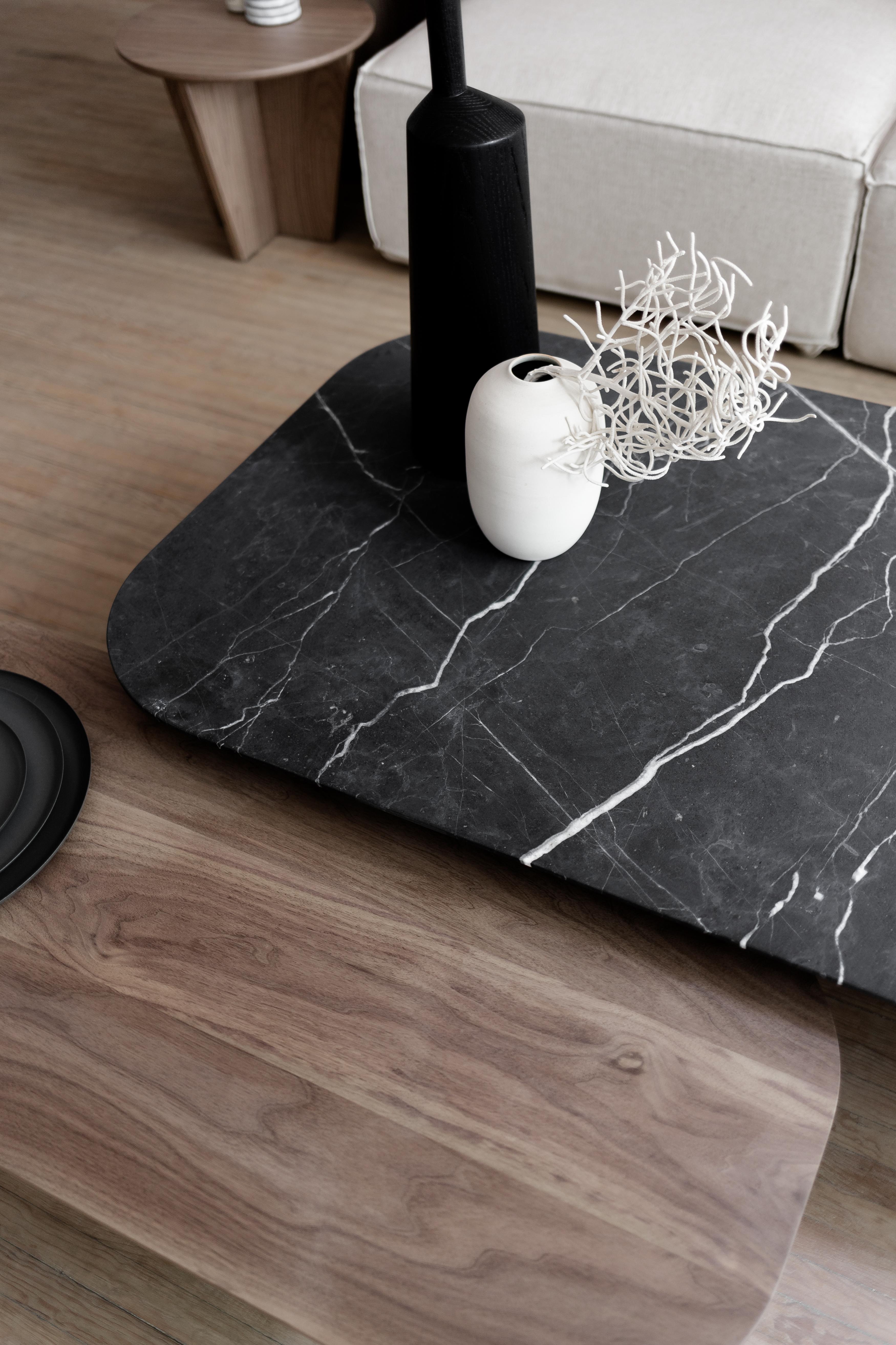 black marble and wood coffee table