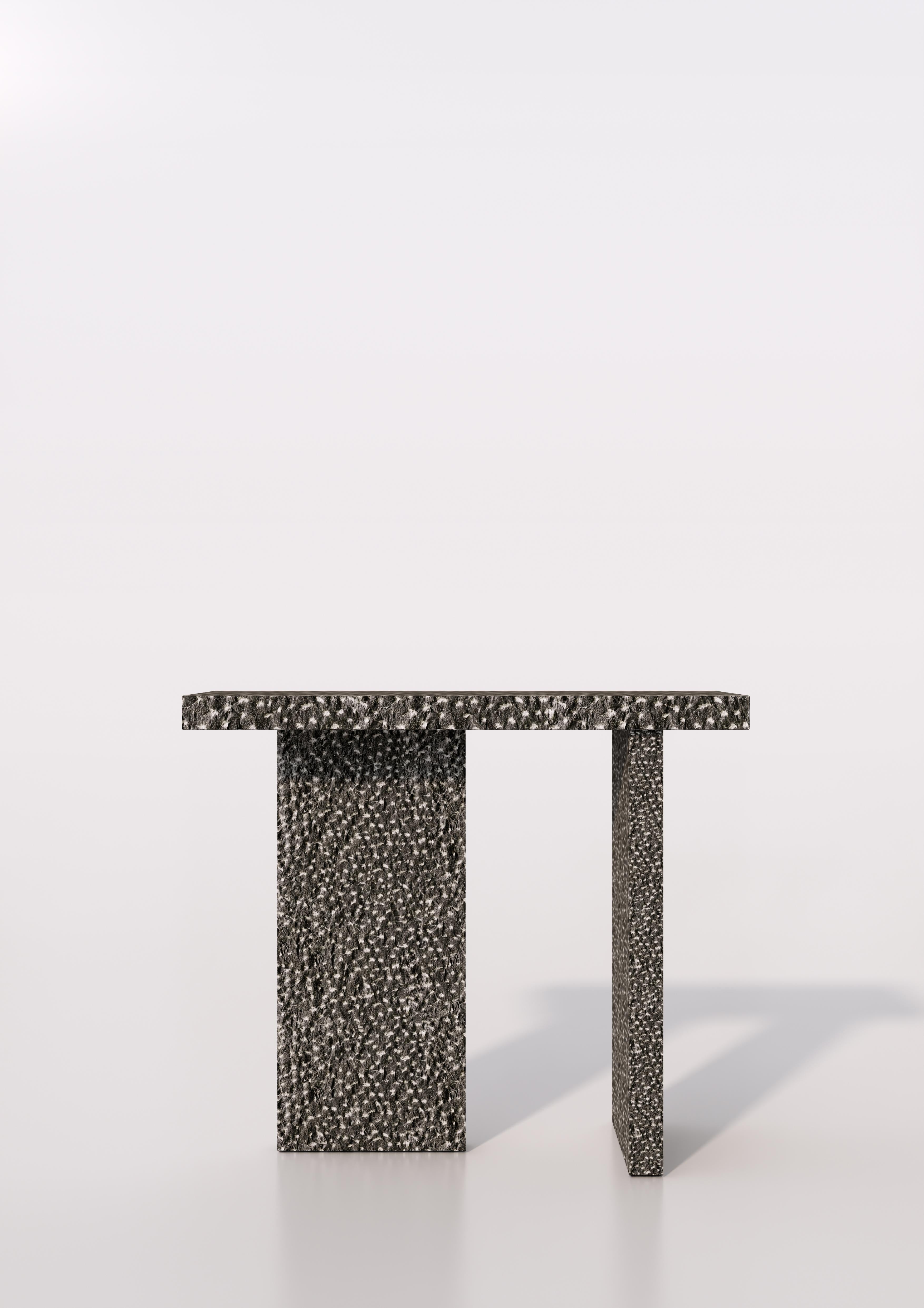 Dolmen Console by Studio Gameiro
Dimensions: D 35 x W 110 x H 90 cm.
Materials: Hand-hammered Blue Irish stone.

Studio Gameiro is an innovative, multidisciplinary, and design-focused agency that specializes in exploring relationships between