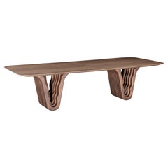 Tavolo da pranzo con base scultorea, piano impiallacciato in noce da 118 pollici, design Dolomitas