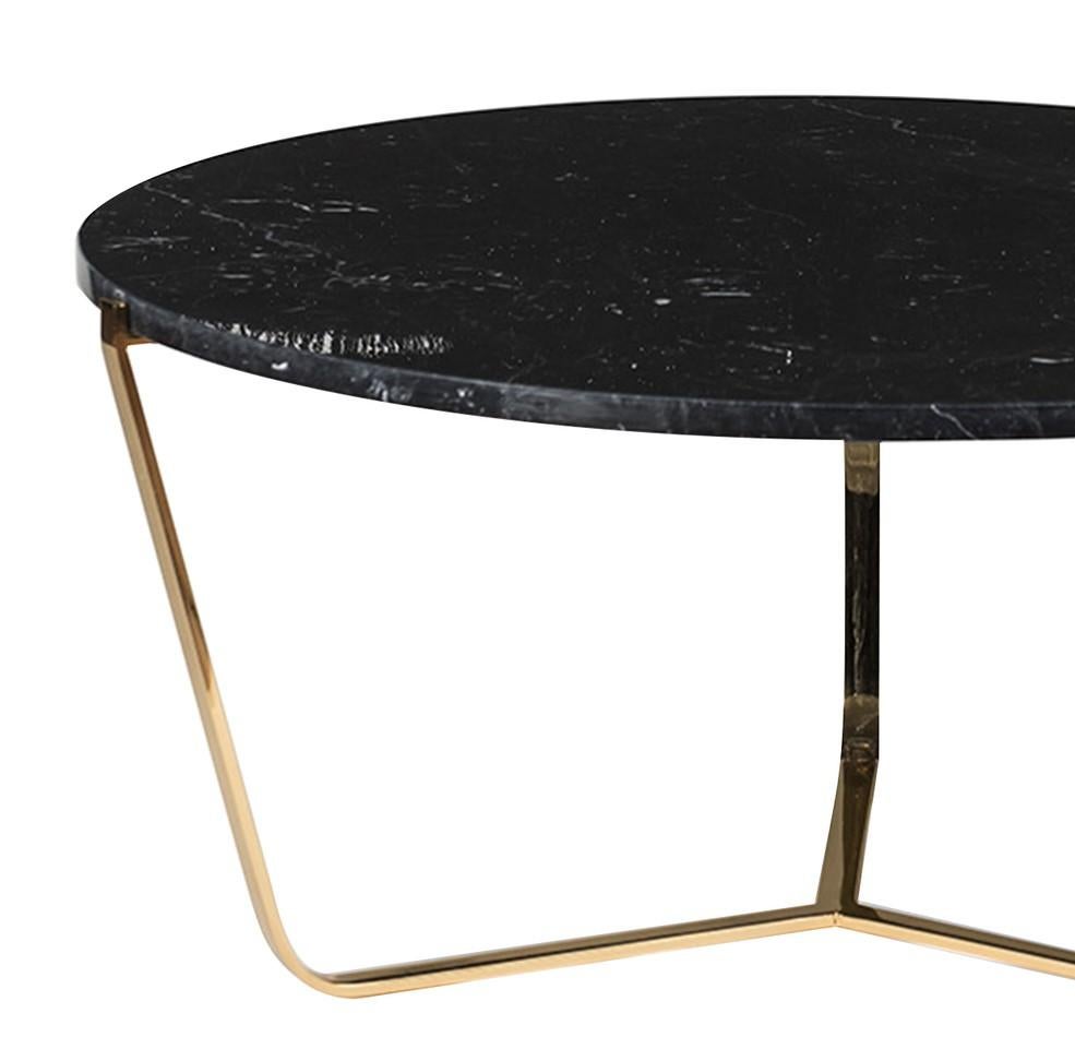 Either alone or paired with its low counterpart, the Dolomiti Marquina marble low coffee table, this piece will make a stunning effect in both a Classic and a contemporary decor. The round top, with radius edges and a 2 cm thickness, is crafted of