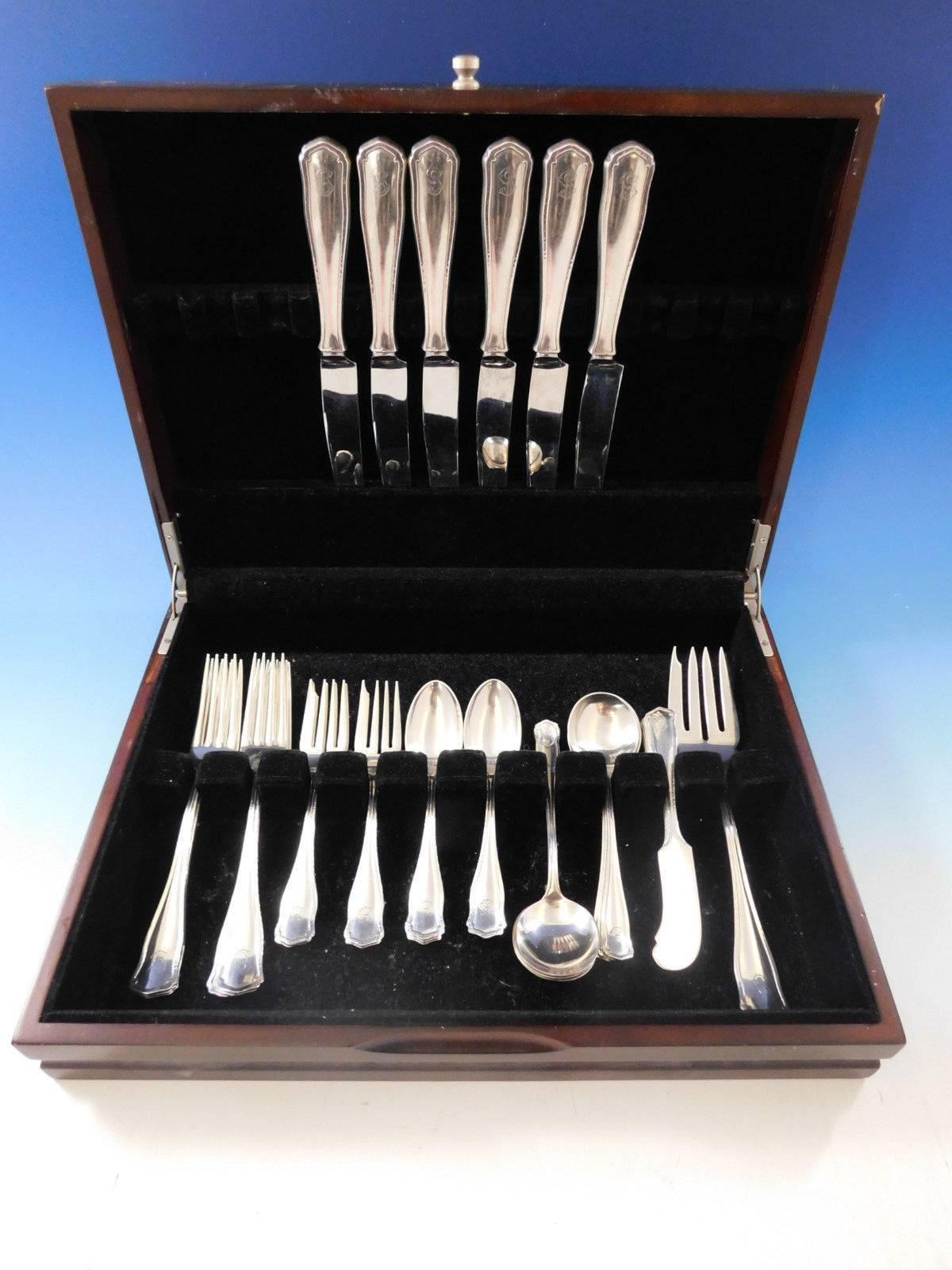 Dolores by Shreve sterling silver Dinner size flatware set - 37 pieces. Great starter set! This Arts & Crafts pattern was introduced in the year 1909 and features a unique raised border. This set includes:

Six dinner size knives, 9 3/4