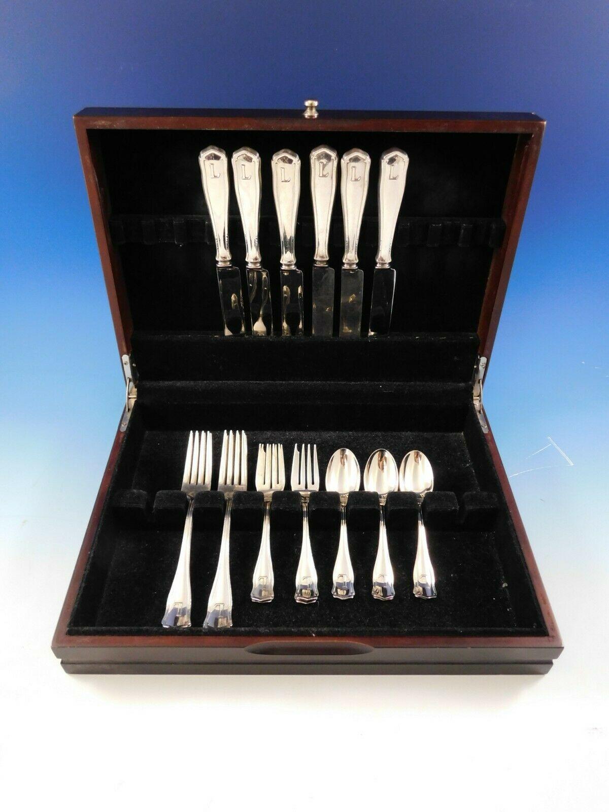 Dolores by Shreve sterling silver dinner size flatware set of 24 pieces. Great starter set! This Arts & Crafts pattern was introduced in the year 1909 and features a unique raised border. This set includes:

6 dinner size knives, blunt, 9 1/2