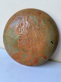 Piatto moderno in ceramica / terracotta di Dolores Porras .Firmato