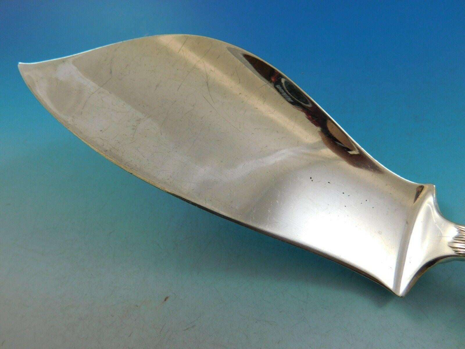 Dolphin by Tiffany & Co.

Masterfully crafted sterling silver fish server measuring 12 1/2