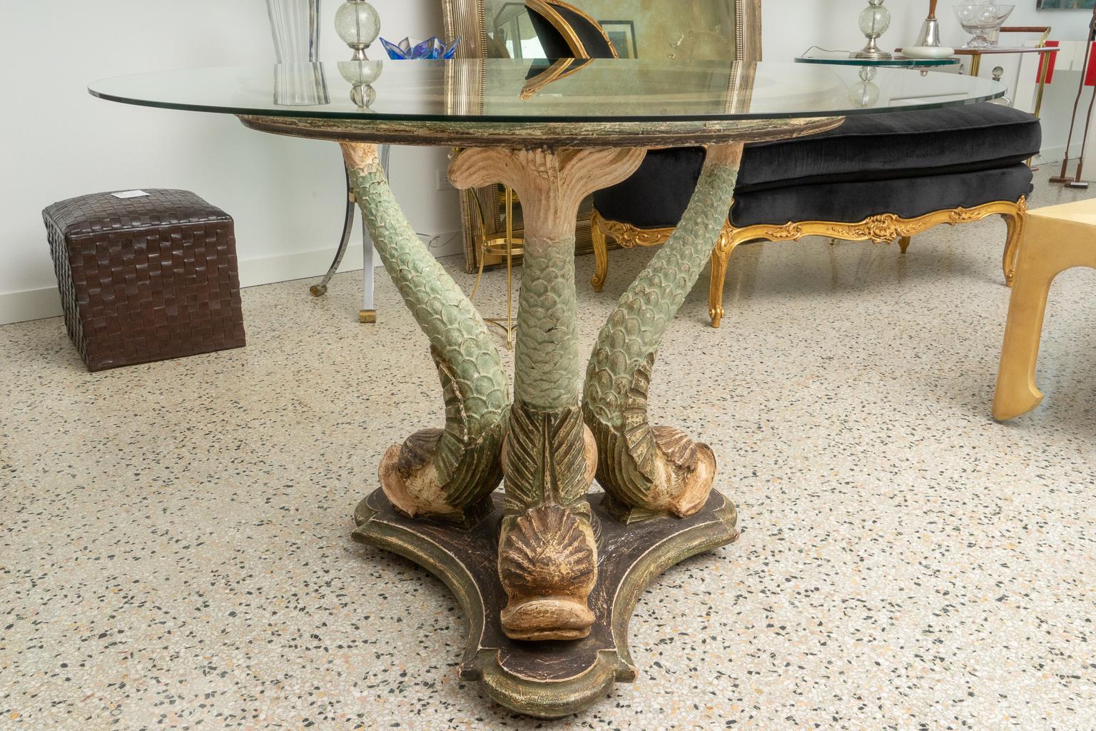 This stylish and chic centre table dates to the end of the 19th century and will make a statement as an entry centre table or perhaps as a dining table. The polychromed finish is subtle and elegant with its subdued color palate.

Note: Dimensions