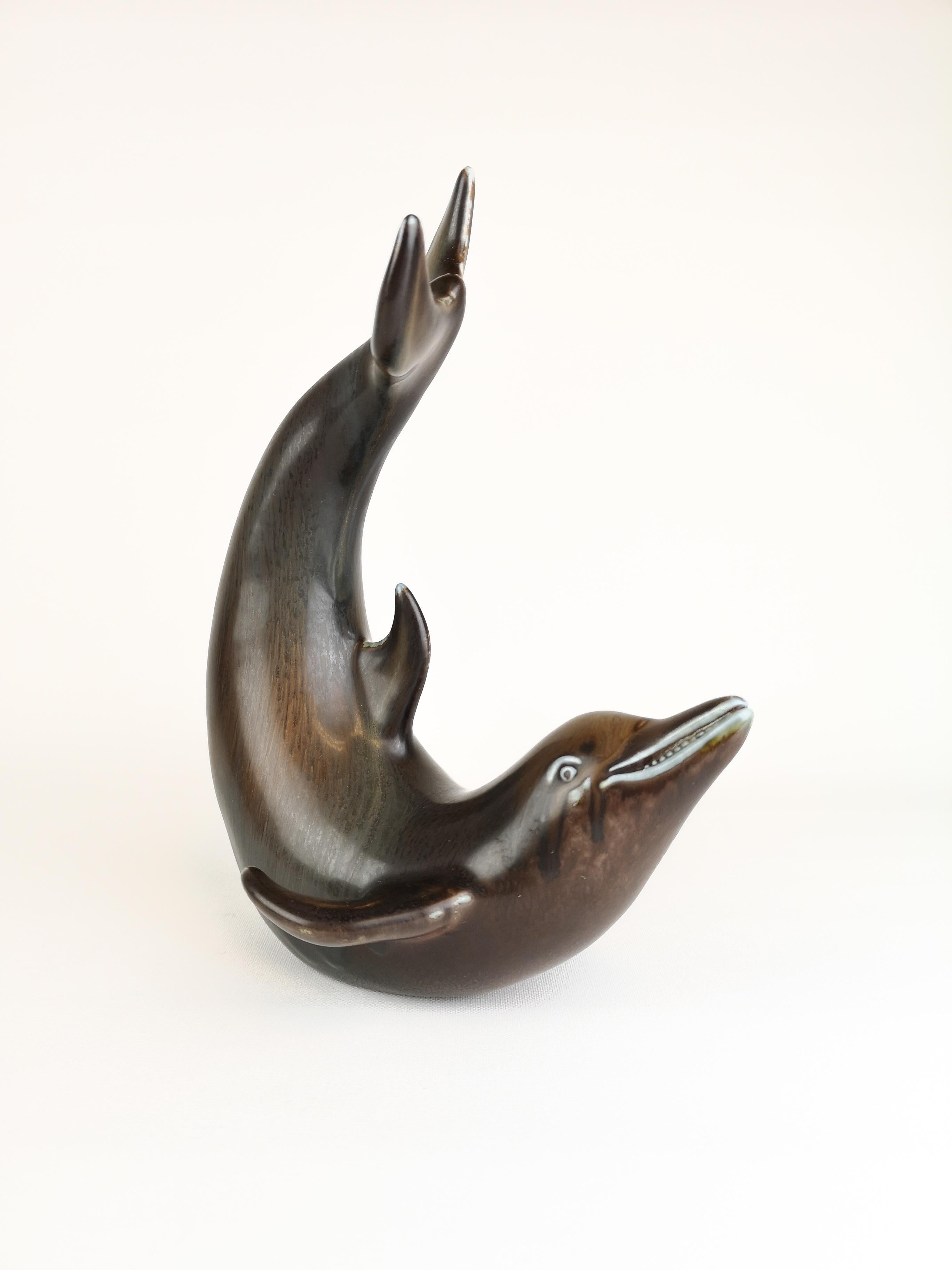 A nice Dolphin from Rörstrand and maker/Designer Gunnar Nylund. Made in Sweden in the midcentury. Beautiful glazed and in good condition.

 