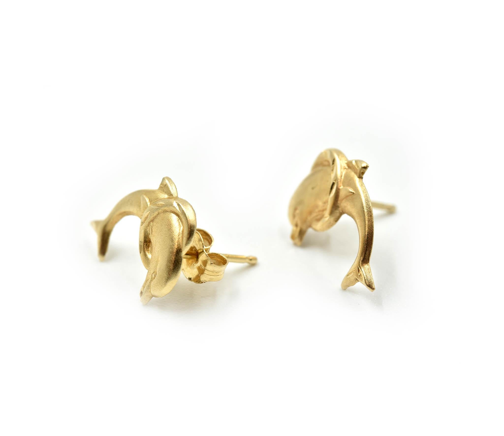 Designer: custom design
Material: 14k yellow gold
Dimensions: each dolphin stud measures a 1/2-inch in length and 3/8-inches wide
Fastenings: friction backs
Weight: 0.30 grams
