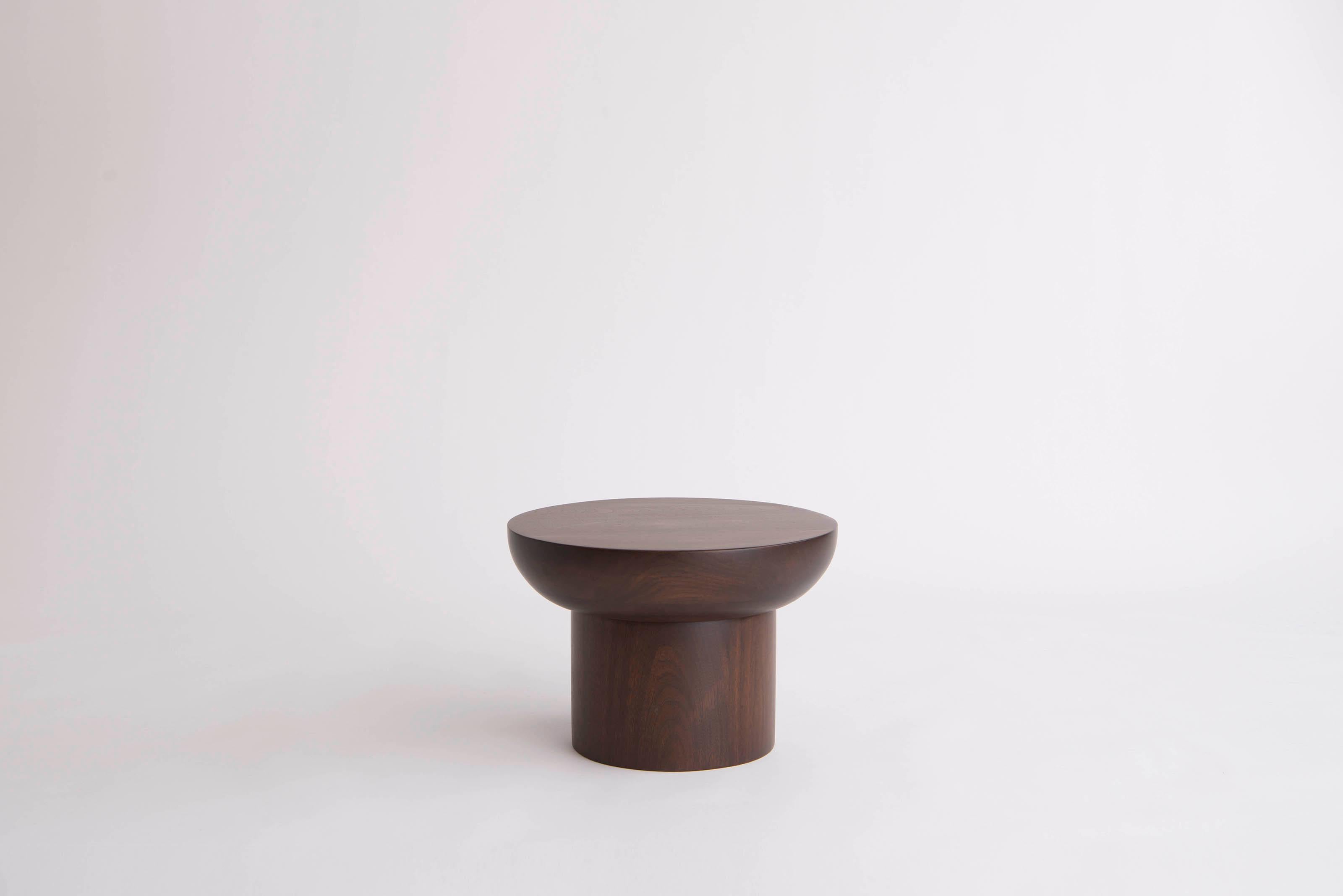 Dombak Small Side Table by Phase Design
Dimensions: Ø 40,6 x H 28 cm. 
Materials: Walnut.

Turned solid wood construction available in walnut, white oak, or ebonized oak. Available in three different sizes. Prices may vary. Please contact