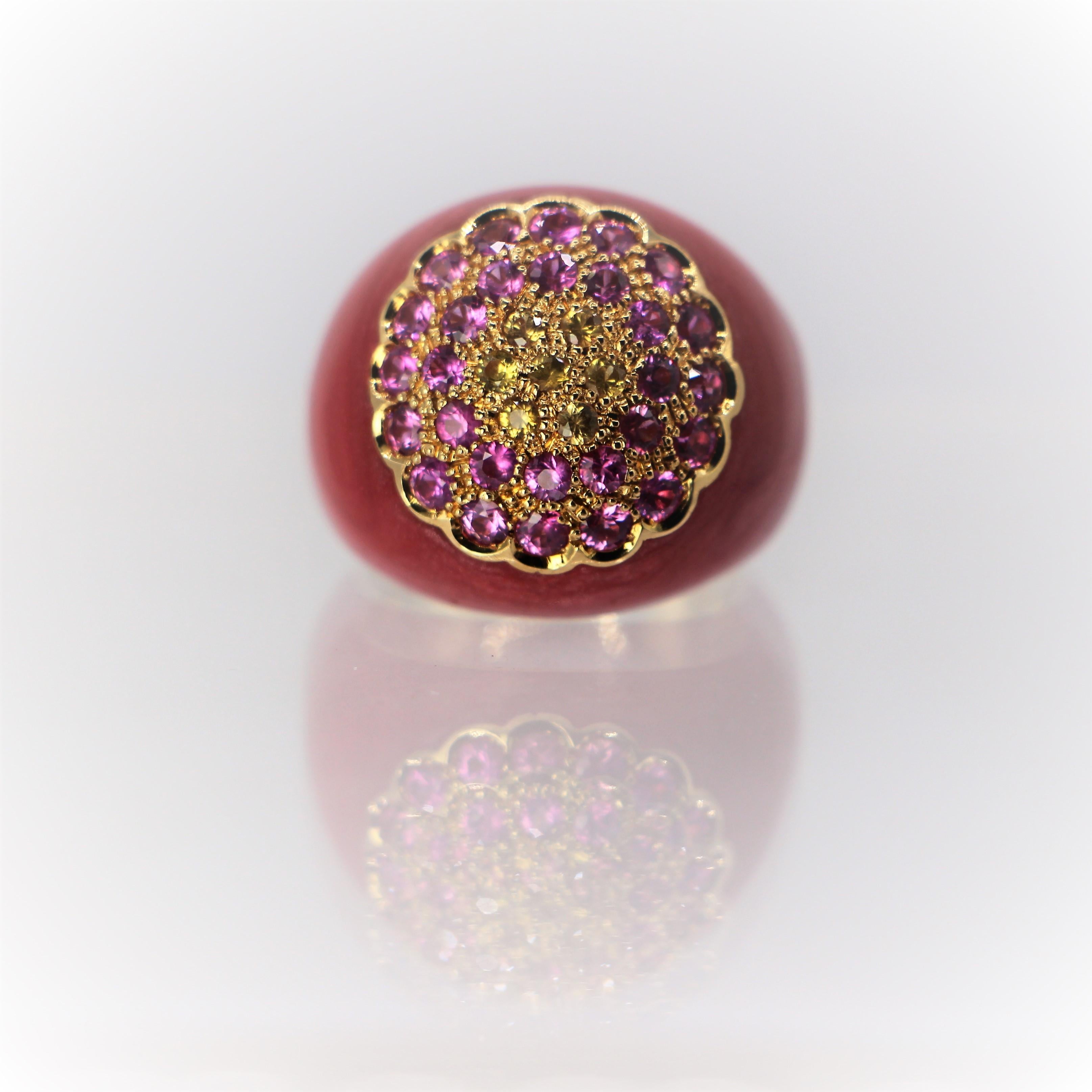 Dome Enamel in Coral red Color ring in 18Kt Gold. A Statement Ring with pink and yellow sapphires.
This stunning ring is handcrafted in 18Kt gold, feature coral color enamel. The enamel on the ring is excelled, it's  the result of a handmade and