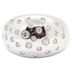 Kuppelring mit Diamanten aus 18 Karat Weißgold