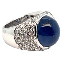 Dome Ring Surmounted by a Cabochon of Sapphire Set with Diamonds 18K White Gold