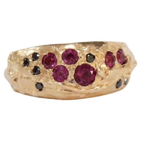 Dome Ring with Black Diamonds and Pink Garnets in 14K Gold For Sale