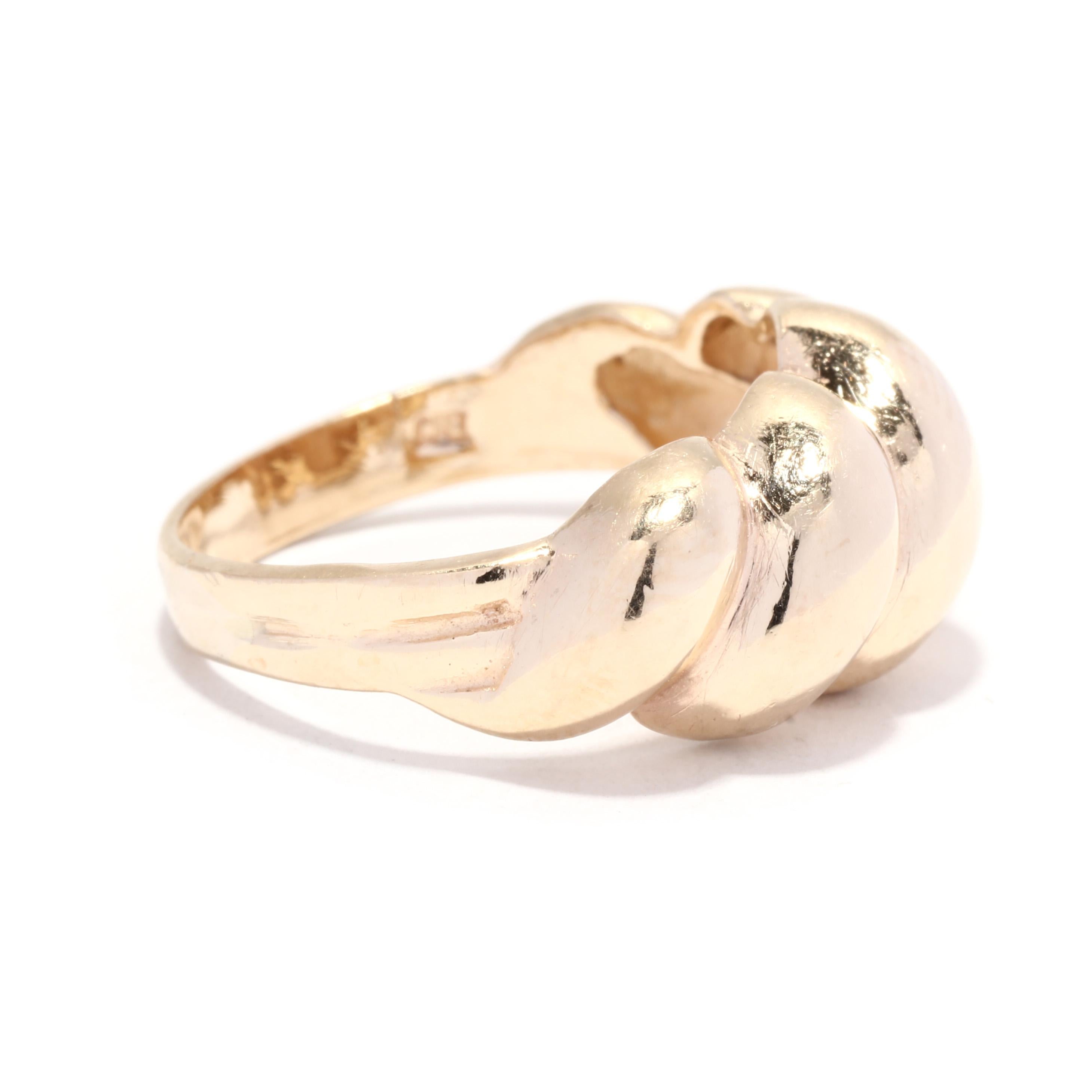 A vintage 10 karat yellow gold domed croissant ring. This stackable ring features a domed ridged design and with a tapered band.

Ring Size 6.5

Rise Off Of Finger: 5 mm

Length: 3/8 in.

Weight: 2.9 dwts. / 4.5 grams

Stamps: 10K CMJ

Ring Sizings