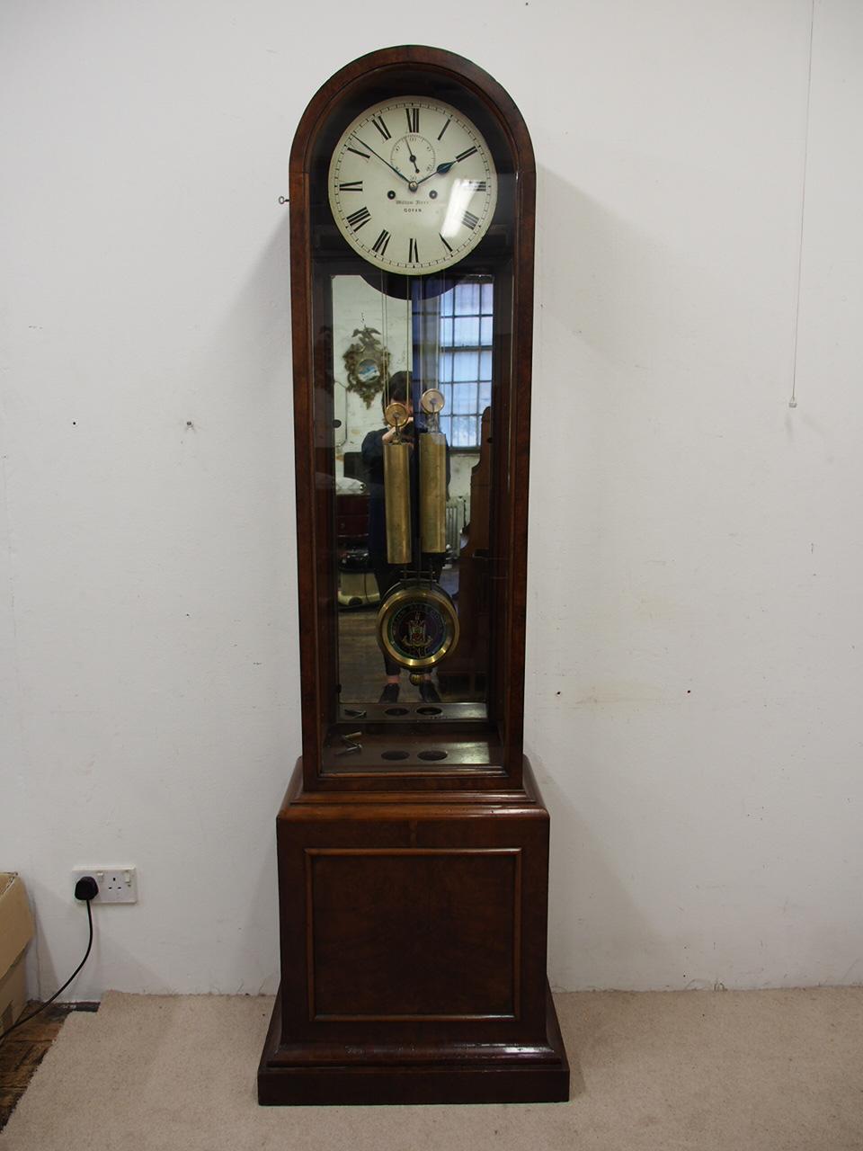 Rare domed top walnut and burr walnut clock by William Barr of Govan, circa 1800s. It has tempered steel hands, with a wood, brass and painted pendulum and a painted panel to the face. This has a coat of arms, and features the clockmakers name. The