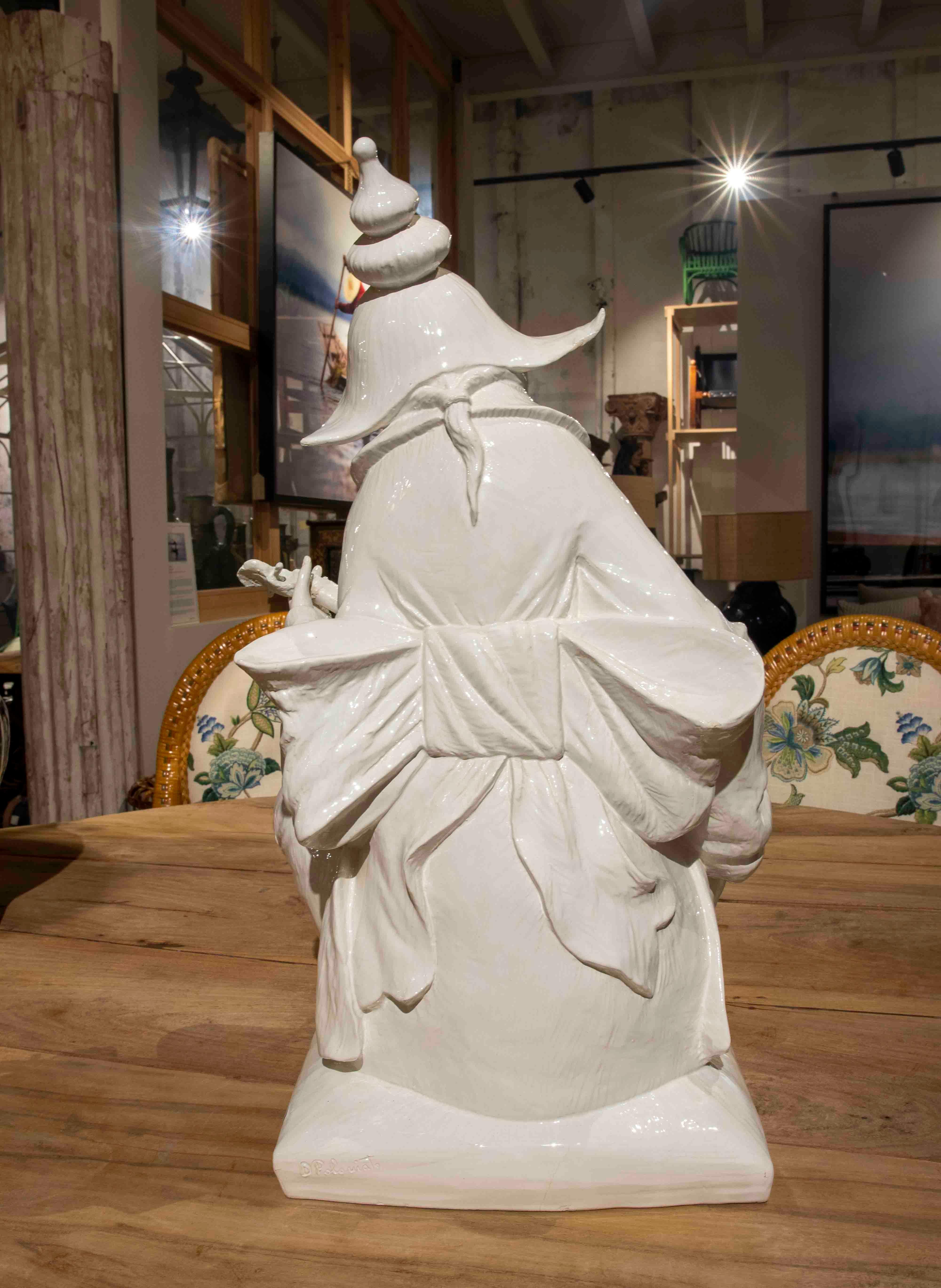 Italian Domenico Poloniato`s White Glazed Ceramic Figure of an Oriental Character For Sale