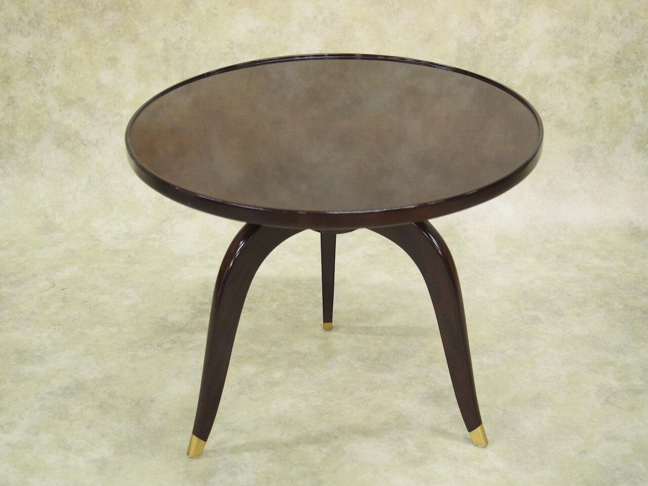 French Modernist Art Deco side table by DOMI, with macassar ebony soleil pattern top and mahogany legs with bronze mounts. Documented Mobilier & Decoration, 1934. 27.5” diameter x 22” high. Restored and refinished. 

Model used in the residence of