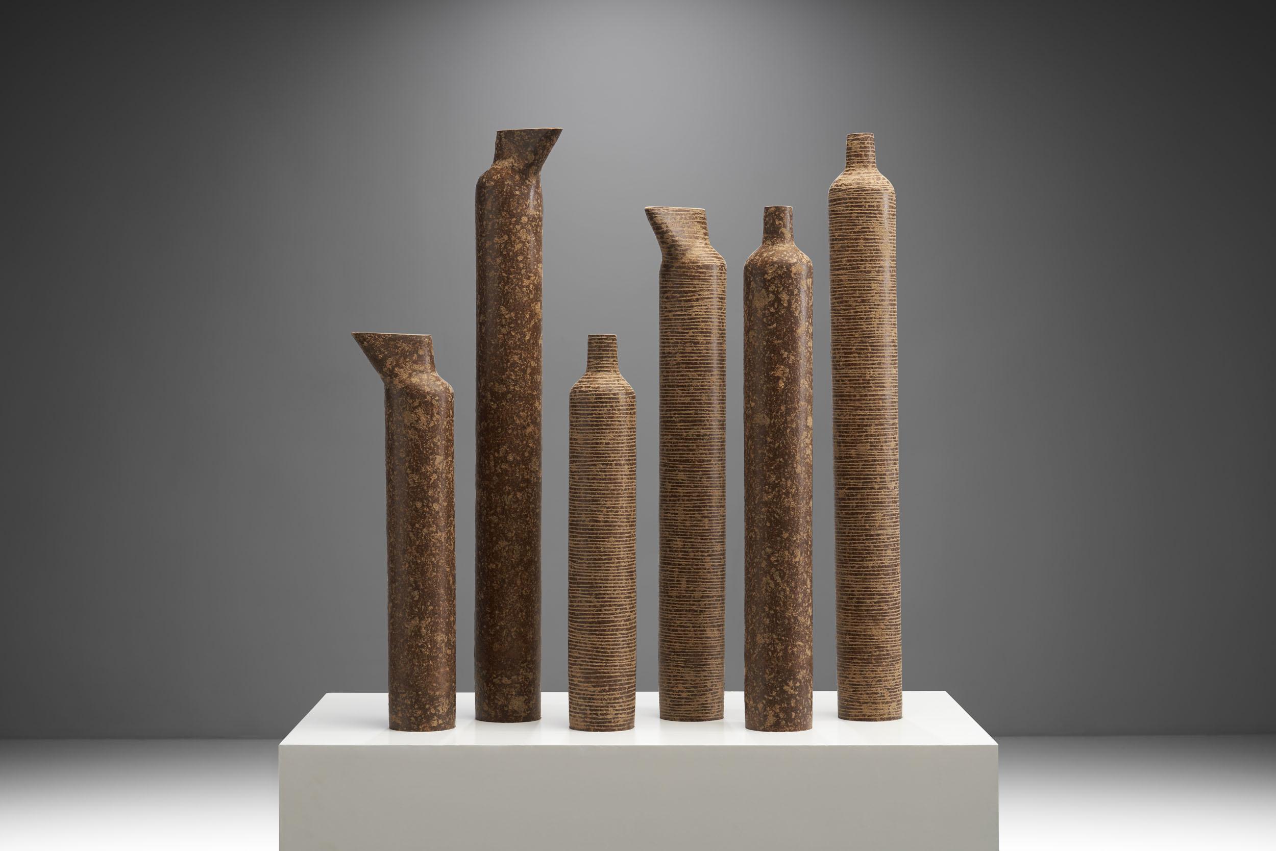 These diverse “Anfora” vases by contemporary Brazilian artist Domingos Tótora are prime examples of the artist’s ars poetica: “I’m a mix of artist, designer, and craftsman.” Additionally, the environmentally conscious artist creates his sculptural