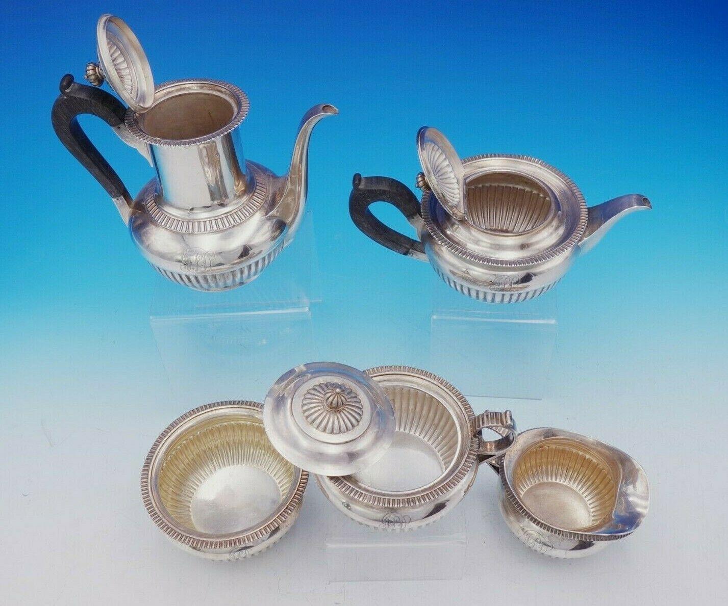 Dominick and Haff

Gorgeous Dominick and Haff sterling silver 5-piece tea set marked #134. It features carved wood handles and fluted design. It also has a date mark for 1884 and was retailed by Shreve. This set includes:

1 - Tea pot: Measures 9