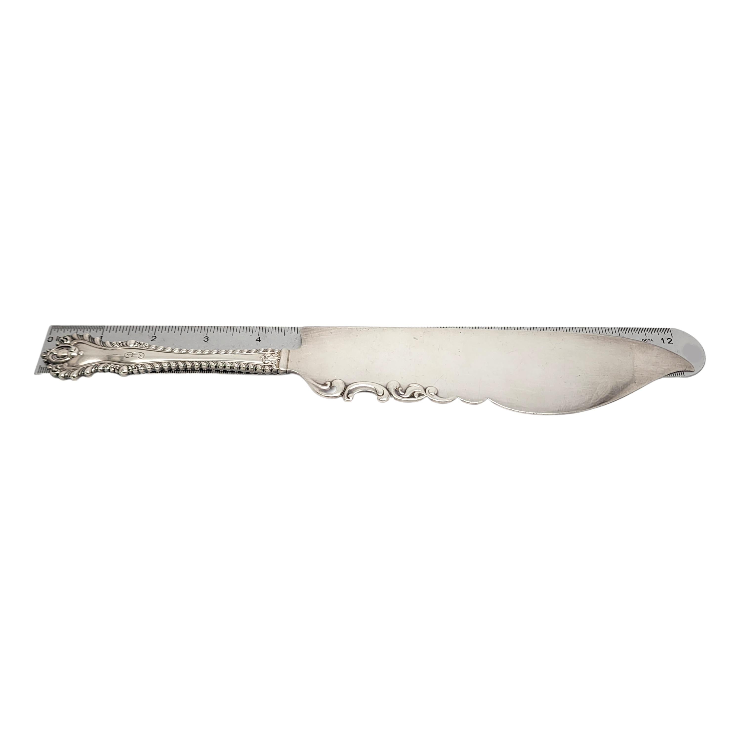 Antique large solid sterling silver ice cream server by Dominick & Haff in the Mazarin 1892 pattern.

Monogram appears to be B

Dominick & Haff's Mazarin pattern was introduced in 1892. This ice cream server is larger than most and features an