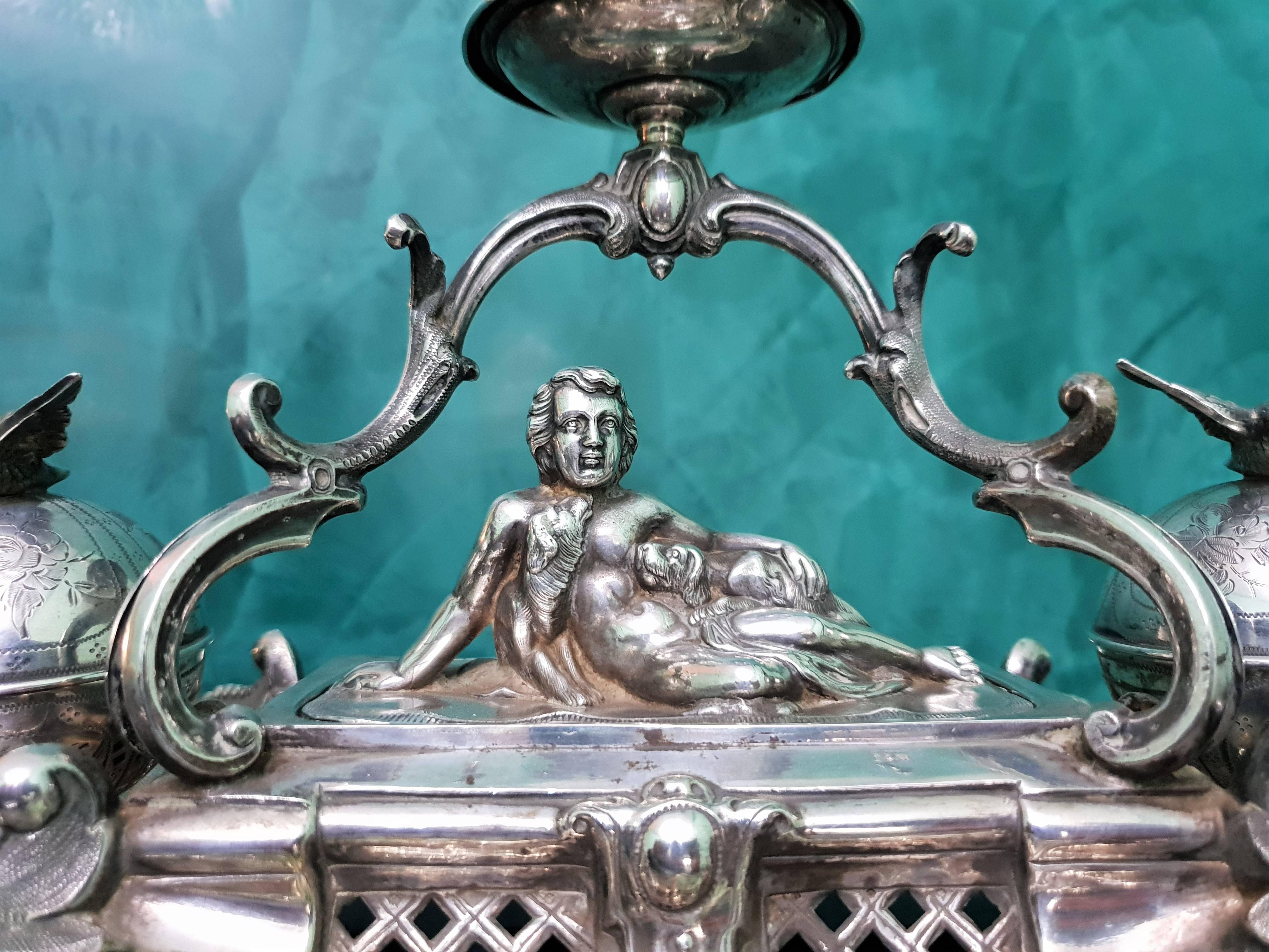 Rare impressive silver ink stand realised by Dominikus Kott (Silberwaren Fabrik, Kott, Walter, Foster) from Schwabisch Gmund (Stuttgart, Germany). Dated circa 1820.
Embossed and engraved by hand and composed by multiple removable parts like the